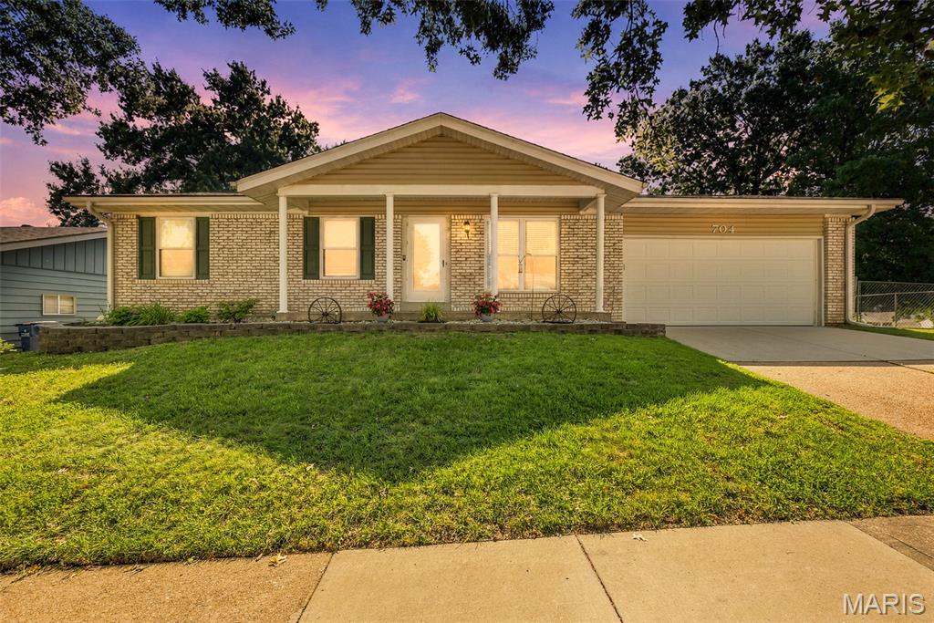 Showings Begin Monday July 6th. Welcome to this beautifully maintained brick ranch located in a highly desirable Fenton neighborhood within the Rockwood School District. This move-in-ready home offers 3 bedrooms, 2 full bathrooms, a 2-car garage, and a finished walkout lower level that provides excellent additional living space.

The main level features fresh paint and newer flooring throughout. The kitchen and dining area open to a newer deck (2024)—perfect for morning coffee or relaxing in the evening. The lower-level walkout leads to a spacious backyard and offers flexibility for a rec room, office, or hobby space.
Major updates include:
Roof (2025)
HVAC (2025)
Water Heater (2020)
Located just minutes from Gravois Bluffs shopping and dining, Highway 141, and I-44, this home offers exceptional convenience. The neighborhood includes a playground right around the corner from this house. This home has been lovingly cared for yours and now it is time for the next buyer to call it home!