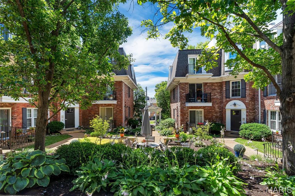 Fantastic Location with the prettiest courtyard in Kirkwood! Second floor, well-maintained condo looks out from its covered terrace to the lovely courtyard below. Only moments away from downtown Kirkwood, this condo has it all: easy one-level living with 3 bedrooms, 2 full baths, dining room, living room, kitchen and 1 garage space below that can be reached either by the stairs or the elevator right outside the condo door. The roof was replaced last year and the the electric panel in the unit was just replaced in June. The roof was replaced last year, there are newer stainless steel appliances and the condo was recently painted in a lovely neutral color. The complex is cozy, with only 20 units - all have either a patio or balcony overlooking the courtyard. To top things off, the location is ideal - just on the edge of downtown Kirkwood with all the fun dining and shopping experiences there!
