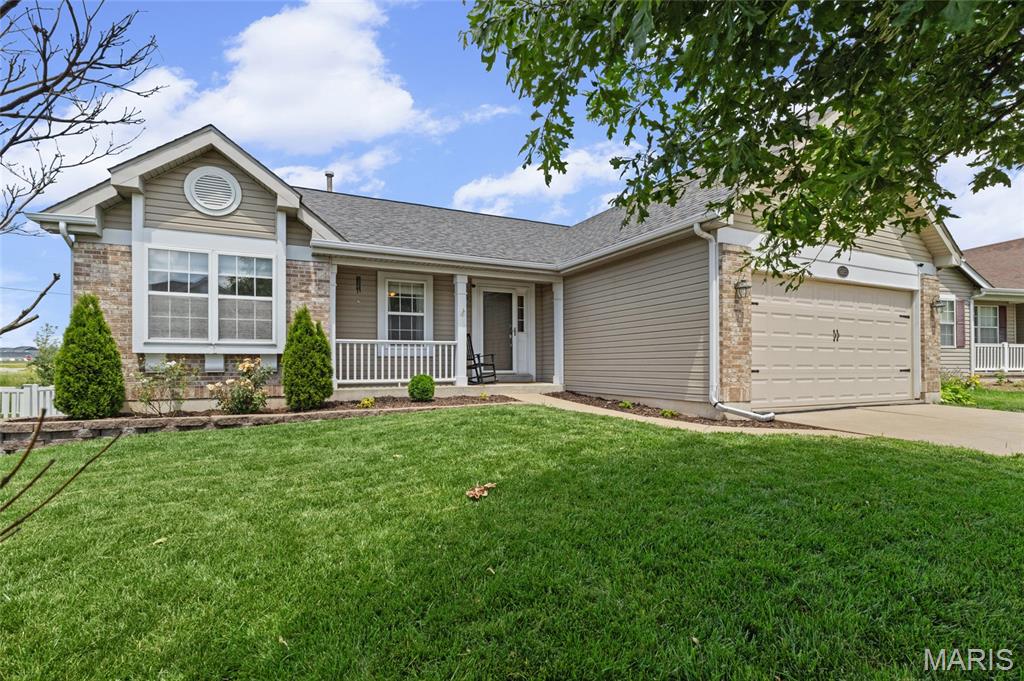 Welcome home to this beautifully maintained 3-bedroom, 2-bath ranch offering comfortable living space in one of Lake St. Louis' most convenient locations! Situated in a highly sought-after school district and just minutes from shopping, restaurants, parks, and everyday amenities, this home combines the space you need with the location you'll love. Step inside to an inviting open layout highlighted by soaring vaulted ceilings and a cozy fireplace. The kitchen features a peninsula breakfast bar, ample cabinet space, and flows seamlessly into the breakfast nook and bright sunroom-ideal for morning coffee, casual meals, or relaxing. The spacious primary suite serves as a private oasis with an updated en-suite bath and generous closet space. Main floor laundry adds convenience to your daily routine, while the thoughtful floor plan offers comfortable living for anyone. Outside, enjoy the fenced backyard with plenty of room for kids, pets, gardening, or entertaining guests. With all the desirable features this home has to offer this one won't last long.