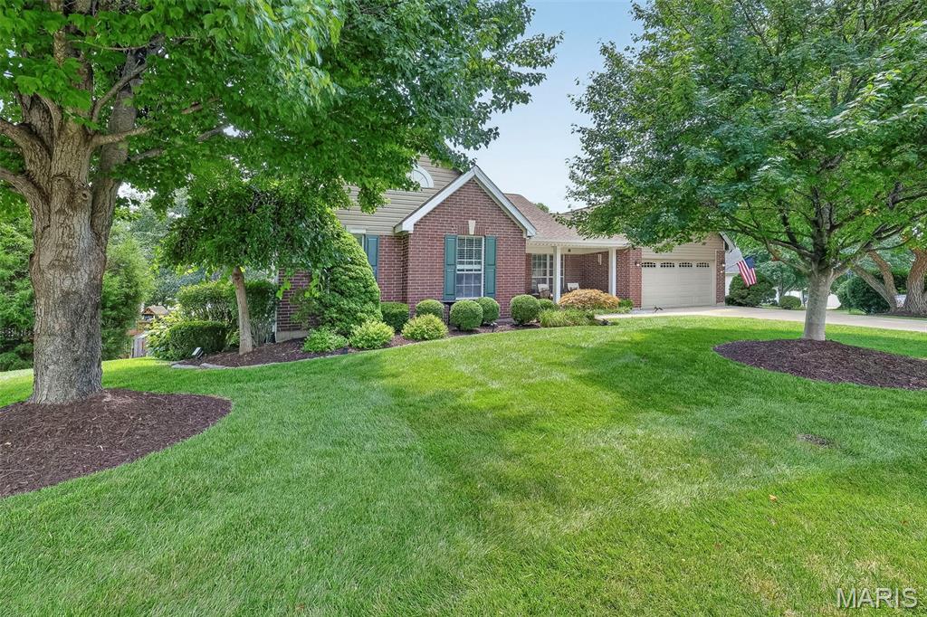 "Where Everyday Living Feels Like a Weekend Getaway" Major Improvements with Resort Style Amenities! This Immaculate Atrium Ranch immediately welcomes you with exceptional curb appeal  via a large 20'x 8' covered porch entry with meticulous landscaping! Upon entering thru the beautiful sidelight front door you will find an open floor plan with 4 bedrooms, 3 full baths and over 3,425 sf of finished living space including a finished walk-out lower level. Meticulously maintained and thoughtfully updated, these recent additions will bring you "PEACE OF MIND" for many years to come! A new roof (June 2026), Emerald HVAC system, APCO Whole House UV Air Purifier, AprilAire Humidifier/Dehumidifier, Bradford White Water Heater (all in 2025) and soon to include, a new Seller funded Timber Tech Composite Deck (2026)! A premium swim spa brings together the indoor/outdoor comfort, quality and lifestyle. The beautifully updated kitchen showcases custom 36" soft close cabinetry, quartz countertops, wine rack, track lighting and quality GE Gallery appliances. Outside, a professionally designed landscape plan, curated with mature trees, extensive plantings and an irrigation system. A complete uplighting package completes the private backyard oasis, ideal for peaceful relaxation and outdoor entertainment fun. The split-bedroom floor plan on the main floor is dominated by the spacious Primary Bedroom ensuite featuring a double sink vanity, full mirror, soak tub and separate shower. Additionally, on the main level, 2 generously sized bedrooms with another full bath situated on the opposite side of the residence. The dramatic family room features a soaring 14-foot cathedral ceiling with overhead fan and lighting package, stunning raised hearth fireplace w/mantle and abundant natural light pouring thru the back Atrium wall of temperature reducing tinted glass windows. The formal dining room provides elegant entertaining space, while the breakfast eating area, with bay window, offers convenient everyday dining. The Breakfast nook opens with a sliding glass door to the "Coming Soon" large (17'x 14') TimberTech Deck w/ retractable awning shade, overlooking a premium swim spa in the private backyard sanctuary. The finished walkout level expands the living space with a fourth bedroom, full bathroom with open recreation area and a large dedicated fitness room which could easily become a home office. The lower level features newer 7" wide plank vinyl flooring, large screen TV viewing area and wet-bar w/refrigerator and cabinets! Ample storage space remains and a direct walkout access to the spacious patio enhances the home's seamless indoor-outdoor living experience. And finally, ADT Security System w/front door Security Cam and an OVERSIZE 2+ car Garage w/insulated door and transom windows, remote openers and keypad entry!  7462 Little Oaks is THAT home with the rare combination of space, updates, privacy and functionality. Looking for VALUE? An opportunity like this doesn't appear often. You won't want to miss!  Hurry!!
