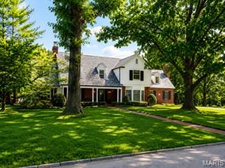 Nestled on a premier lot in one of Ladue's most prestigious neighborhoods, 66 Briarcliff is an extraordinary residence offering exceptional living spaces designed for both entertaining and comfortable everyday living. Gracious living and dining room are complemented by a warm inviting family room creating a perfect blend of sophistication and function. French doors open to a screened porch-- perfect setting for indoor/outdoor living.
The updated kitchen has white cabinetry, high end appliances, center island and adjoins a lovely breakfast room which walks out to a brick terrace overlooking the sparkling pool. The pool is surrounded by mature trees offering privacy. The adjacent yard provides abundant space for soccer, baseball or any other games!
The upstairs leads to 4 ensuite bedrooms accessed by both  front and back stairs. The primary suite has a spacious dressing room which is a real treat.
The finished lower level expands the living space with a large entertainment room with new built in cabinetry, an office and bath.
The whole home generator, 3 fireplaces, main floor laundry make this home a true gem. This is a rare opportunity to own an exceptional home in Ladue Schools combining outstanding amenities and incredible outdoor space.