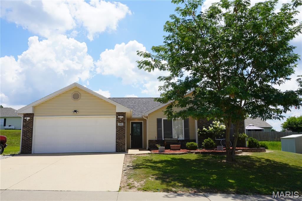 This well-maintained three-bedroom, two-bath ranch-style home is situated in the desirable Pioneer Ridge subdivision of Waynesville. Upon entering, you’re welcomed into a spacious living room featuring vaulted ceilings and durable laminate wood flooring that create an open, comfortable feel. The kitchen offers painted cabinetry paired with stainless steel appliances, providing a clean and functional space for daily living.

The primary suite includes LVP flooring, a walk-in closet, a single vanity, and a tub/shower combination. Two additional guest bedrooms, also finished with LVP flooring, share a full bathroom conveniently located nearby.

Notable updates and features include a new roof completed in July 2024, HVAC system equipped with a UV light sterilization system. Home has new appliances that are a year old,  and a fully privacy-fenced backyard. The outdoor space is complemented by an 8’ x 15’ concrete patio and attractive landscaping, offering a pleasant area to relax or entertain. A two-car garage adds practicality and storage.