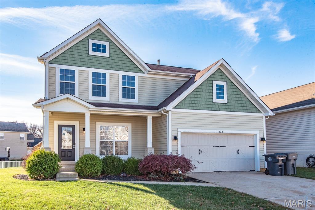 Welcome to 424 Country Stone Drive — a 4-bedroom, 2.5-bath two-story tucked into the sought-after Countryshire community in the heart of booming Wentzville.

With 2,496 square feet of open-concept living, a cozy gas fireplace, and hardwood floors throughout the main level, this home is the perfect canvas for a buyer ready to add their personal touches and make it truly their own.

Upstairs, four generous bedrooms include a primary retreat with walk-in closet. Downstairs, a full unfinished basement offers serious room to grow — finish it for a rec room, home gym, or additional bedroom down the road.

Step outside to a fully fenced backyard built for barbecues, kids, and pets.

Families will love access to top-rated Wentzville R-IV schools, with Liberty High as the district anchor. The neighborhood itself delivers resort-style amenities — community lake, pool, tennis courts, and playground — for one of the most affordable HOAs around at just $475 per year.

Add in main-level laundry, a 2-car attached garage, and a location minutes from Lake Saint Louis shopping, dining, and quick access to Hwys 40/61 and 70 — and you've got one of the fastest-growing, most family-friendly pockets of the St. Charles County metro.

Opportunity is knocking. Bring your vision.