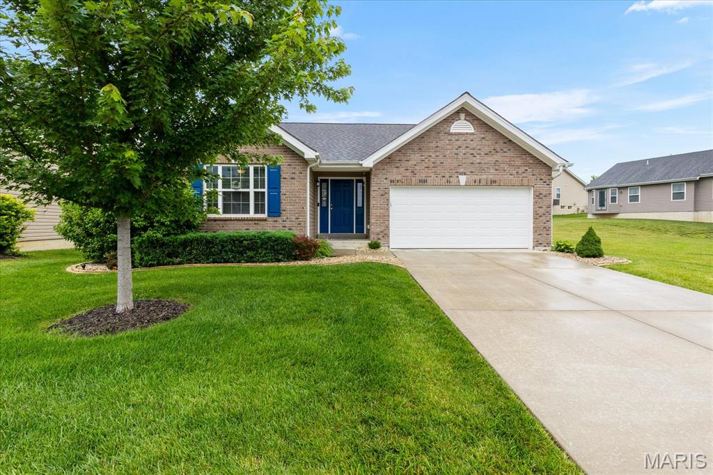 Shows start Saturday June 27th. Welcome home to this beautifully updated ranch in the desirable Oaks at Lexington! Offering 4 bedrooms, 3 full bathrooms, a finished lower level, and a 2-car garage, this home combines modern updates with functional living spaces. Step inside to an inviting open-concept floor plan where the spacious living room flows seamlessly into the kitchen and breakfast room. The kitchen features 42-inch cabinetry, granite countertops, a breakfast island with seating, plenty of cabinet space, and a custom pantry organizer for added convenience. Luxury vinyl plank flooring extends throughout the entire home—including all bedrooms and the finished basement—for a cohesive, low-maintenance finish. The main level offers an updated primary suite featuring an updated bathroom and custom closet organizer, along with two additional bedrooms and a second full bathroom. Downstairs, the finished lower level provides even more living space with a large recreation room, fourth bedroom, full bathroom, custom built-in storage drawers in the staircase to maximize organization and a wet bar rough in. Enjoy your morning coffee or unwind in the evenings on the backyard patio overlooking the spacious, level yard. Additional updates include a newer roof (December 2023) and an irrigation system installed in May 2025. Residents of Oaks at Lexington enjoy a neighborhood playground, all while being just minutes from shopping, restaurants, and easy access to Highway 70 and Highway 61.