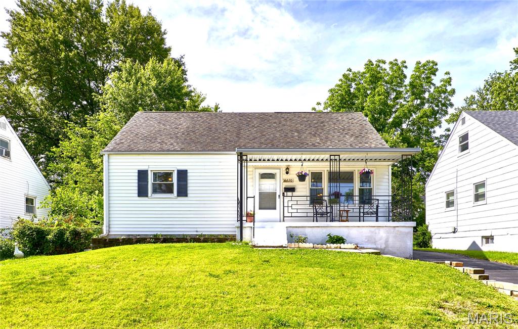 SELLERS ARE MOTIVATED TO SELL! This charming 4-bedroom, 2-bath home combines spacious living areas, stylish updates, and endless potential. Step inside to an inviting open floor plan featuring durable wood laminate flooring throughout the bright and spacious living room, which flows seamlessly into the separate dining area and breakfast room — perfect for everyday living and entertaining.

The updated kitchen shines with crisp white cabinetry, subway tile backsplash, and stainless steel appliances, creating a fresh and modern feel. Just off the dining area, the cozy sunroom offers the perfect spot to relax year-round, complete with luxury vinyl plank flooring and a ceiling fan.

Two main-level bedrooms feature luxury vinyl plank flooring and share an updated full hall bath with a modern vanity and tub/shower combo. Upstairs, you’ll find two additional bedrooms with newer neutral carpeting and a second full bath with shower, offering flexible space for guests, family, or a home office.

Outside, enjoy the charming covered front porch, spacious patio, fenced backyard, and detached one-car garage with additional storage space. The long driveway provides ample off-street parking. A wonderful opportunity offering space, updates, and value all in one!