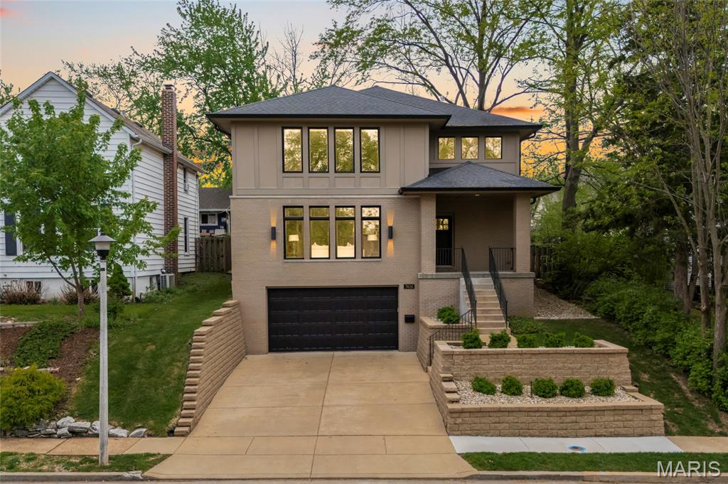 Spectacular custom built 11-year-old, 2-story home in the heart of Richmond Heights – Top Rated Clayton Schools. This 5 bedroom, 4.5 bath home boasts a bright and open floor plan, perfect for today’s lifestyle, with 4200 square feet of living space, including the finished lower level. 

When you drive up to the property you will see pride of ownership, and once you walk through the front door, into the entry foyer, you will know you are home. Main floor features a separate living room / formal dining room, with floor to ceiling windows, bringing a ton of natural light in, a lovely powder room, a chef’s dream gourmet eat-in kitchen with an abundance of custom cabinetry, Quartz countertops, Wolf oven, high performance range hood, 2 undercabinet Subzero refrigerators (one in butler’s pantry and one in basement with another built in microwave) & large center island / breakfast bar, and opening to the breakfast room & fantastic great room with gas fireplace. 

Walk up the handcrafted staircase to the 2nd floor featuring a spacious master retreat with a luxury bath with double vanity with marble countertops, tub, custom tiled walk-in shower, and his & her custom organized walk-in closets. You will also find 3 more nicely sized bedrooms, one en-suite with its own full bath, the other 2 sharing the hall bath. If that is not enough, how about 2nd floor laundry! 

The professionally finished lower level features a rec room (wired for surround sound), the 5th legal bedroom, and the 4th full bath, still leaving a nice unfinished storage area. Additional features include zoned HVAC, 2 hot water heaters, gleaming hardwood floors, whole house vacuum system, Ethernet wired throughout, security & irrigation systems, recessed lighting throughout, professionally landscaped, storage shed in back of yard, and a 3-car attached garage with Tesla charger, just to name a few. Relax outside on the rear patio or sip your morning coffee on the charming covered front porch. 

This home is perfect for entertaining family & friends. Location could not be better – a 5-minute drive to downtown Clayton restaurants, shops, galleries, and a 5-minute drive to Washington University, Barnes-Jewish Hospital, Forest Park, and the Delmar Loop. Easy access to major highways!