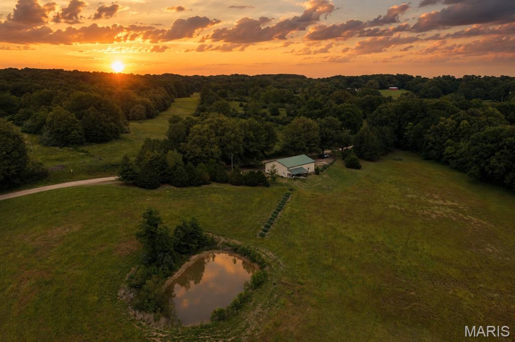 This beautiful farm is conveniently located between Puxico and Wappapello, along County Road 290. The farm consists of a mix of open ground and timber, with a barndominium perfect for a weekend getaway cabin or full-time residence. The open ground is currently used for hay production, but has been tillable ground in the past. The pond and creek provide water to the abundant amount of wildlife that call this farm home. Throughout the mature timber, you will find a mix of open areas, ideal for food plot locations. The mix of water, food, and bedding areas this farm provides, makes the hunting opportunities endless. Lake Wappapello is minutes away, where you can enjoy excellent fishing and boating. Mingo National Wildlife Refuge is also nearby, adding to all the hunting opportunities. If you are looking for a turnkey farm that has a mix of it all, then this is a must-see! Call today to schedule your own private tour.