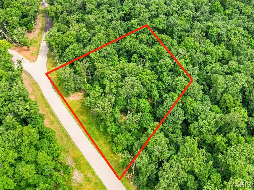Rare Double-Lot Opportunity in the Heart of Innsbrook!
An incredible opportunity awaits with this stunning 2.03-acre homesite — and the neighboring lot is also available, creating the potential for an expansive 4.05-acre private retreat. Nestled among towering hardwoods and set on gently elevated terrain, this property offers sweeping treetop views and a serene, secluded atmosphere. Designed with Innsbrook’s signature Treehouse concepts in mind, this lot is the perfect canvas for a home that feels suspended above the forest floor — blending modern comfort with the beauty of nature. Imagine relaxing on your deck, surrounded by lush woodland and panoramic vistas in every direction. Located in the desirable Tyrolean area, this homesite benefits from a private entrance gate and close proximity to Charrette Creek Commons, scenic lakes, the Tyrolean Nature Trail, and the newly completed pool complex. Whether you’re seeking a peaceful full-time residence or a weekend sanctuary away from it all, this property offers endless potential to bring your vision to life.