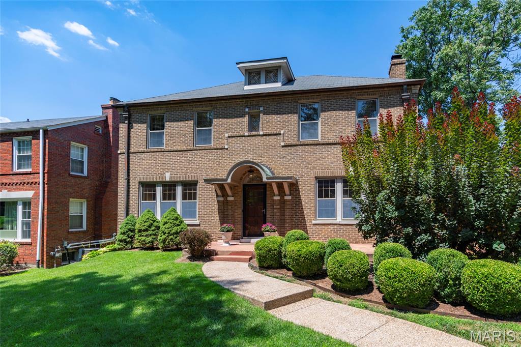 Open Sun, 7/19, 1-3pm. Spectacular all brick, 2-story home located is the desirable University Park neighborhood, in the heart of University City. This 3 bedroom, 2 full bath & 1 half bath home with almost 2400 sqft of living space is painted in neutral designer colors, and it truly is move in ready. 

Once you walk through the solid wood entry door, you will know you are home. Main floor features a lovely foyer, flanked a gracious living room with gas fireplace, and a separate formal dining room, both with dental molding and a tremendous amount of natural light from the large window, an eat-in kitchen with white cabinetry, granite counters, stainless appliances, including fridge & custom hood, and center island / breakfast bar, opening to the fantastic family room / Florida room with custom built-in entertainment center and 3 walls of windows, including a 12 pane glass door, bringing the outside in, and a hip powder room completing the main floor. 

Walk up handcrafted staircase, to the 2nd floor which boasts a special & quite rare primary retreat, with sitting room, built-in coffee bar, huge custom organized walk-in closet, complete with stackable washer & dryer, and a beautiful, updated, en-suite full bath. You will also find 2 additional bedrooms, and the 2nd full bath. 

Additional features include hardwood floors throughout, zoned HVAC (Zone 2: 2022) with Nest thermostats, keyless entry, new front walkway (2025), professionally relandscaped yard (2026), an attached 2-car garage, and an unfinished basement, offering a nice amount of storage space, just to name a few. 

Relax outside on the rear brick patio, in your private fenced-in backyard, or take a stroll through the park-like neighborhood. This home is great for entertaining family & friends, and the location could not be better – just a 5-minute walk to the Delmar Loop, Wash U, Forest Park, or a 5-minute drive to hospitals, and downtown Clayton’s restaurants & shops - easy access to major highways.