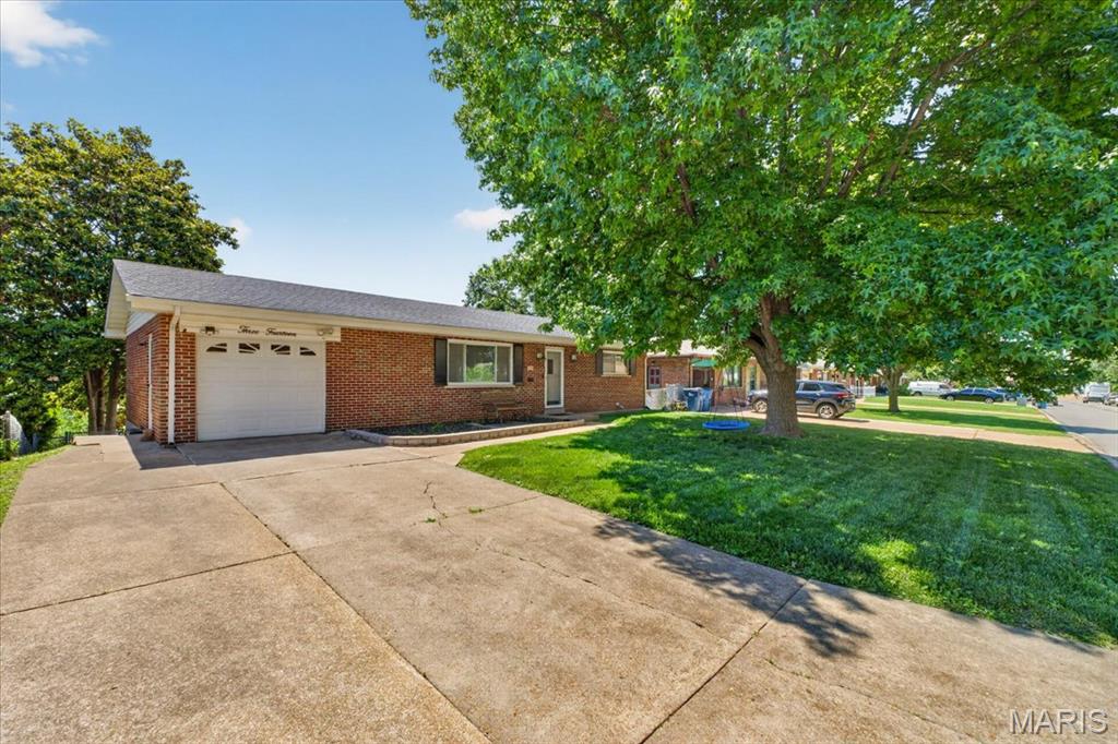 Welcome home to this 3-bedroom brick ranch offering simple, functional living in a classic layout. The main level includes a comfortable living room, eat-in kitchen, and three bedrooms with a full bath.
Notable updates include a newer roof, gutters, electric panel, and furnace, providing added value and peace of mind.
The partially finished walkout basement offers additional living space along with a dedicated laundry area and extra storage, with direct access to the backyard.
A garage adds everyday convenience and additional storage. Solid bones and a great layout make this home a great opportunity for buyers looking for comfort, space, and potential.