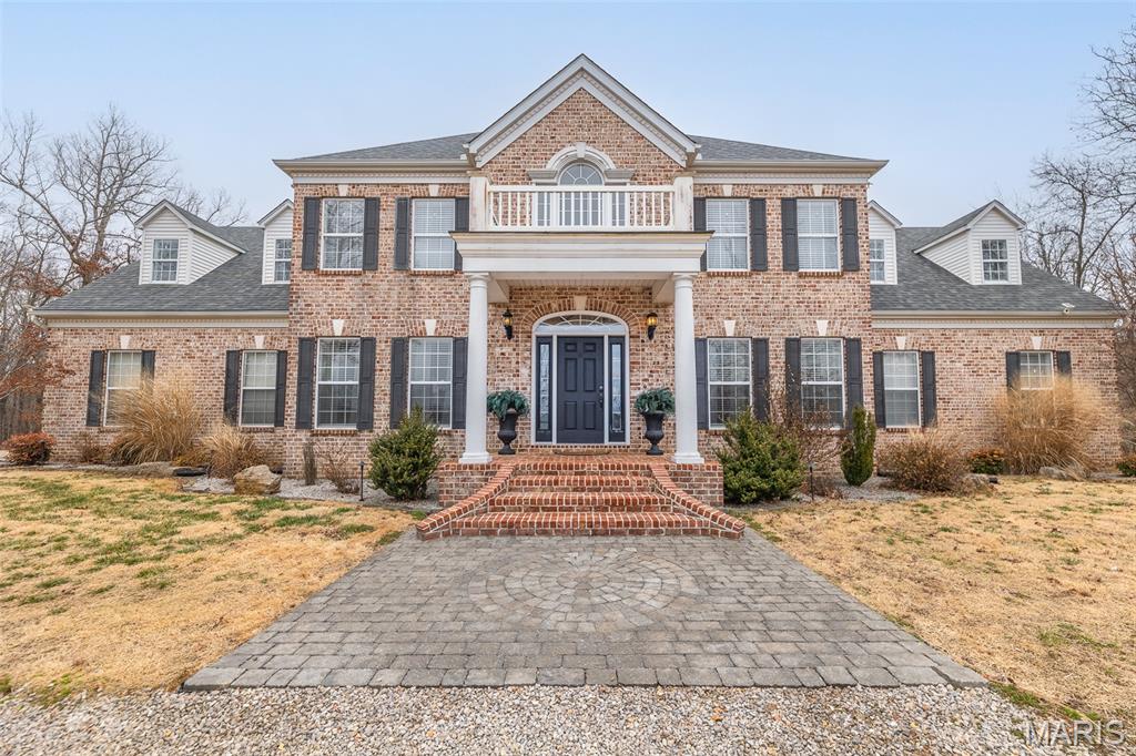 Amazing curb appeal sets the tone for this stunning all-brick estate, perfectly positioned on a picturesque homesite with a sweeping drive. Offering over 6,000 square feet of beautifully updated living space, this 6-bedroom, 5-bath home seamlessly blends timeless design with modern comfort. Inside, soaring cathedral ceilings and abundant natural light create an impressive yet welcoming atmosphere. The spacious living area features a cozy gas fireplace, while the beautifully appointed kitchen showcases new appliances and a custom island that serves as the true heart of the home. Thoughtful upgrades throughout provide both style and peace of mind, including a whole-home water filtration system, new thermostats and updated HVAC motherboards, tinted living room windows, updated lighting and ceiling fans, custom blinds, and a custom-designed master closet system. The expansive full basement, complete with newly added concrete flooring, offers endless potential for additional living, recreation, or storage space. Step outside to your private backyard retreat featuring a newly built deck, pool, and hot tub—perfect for relaxing or entertaining. Extensive dirt work and professional landscaping have transformed the property, including extending the backyard by 15 feet and clearing approximately 50 trees to maximize usable space and open up the grounds. With its combination of size, upgrades, and resort-style amenities, this exceptional home offers luxury living at its finest.