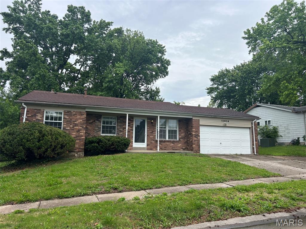Fantastic opportunity in Florissant! This charming, traditional single-family ranch home features 1,135 square feet of main-level living space, offering 3 comfortable bedrooms and 2 full bathrooms. Nestled on a spacious 0.22-acre lot in the Fox Woods One subdivision, the property boasts a great lot and a desirable 2-car attached garage. Inside, you'll find a full basement providing excellent potential for extra storage or future finished living space. Conveniently located within the Hazelwood School District, this home is being sold As-Is, making it an incredible canvas for equity builders, first-time buyers, or investors looking for their next project. Schedule your showing today and imagine the possibilities!