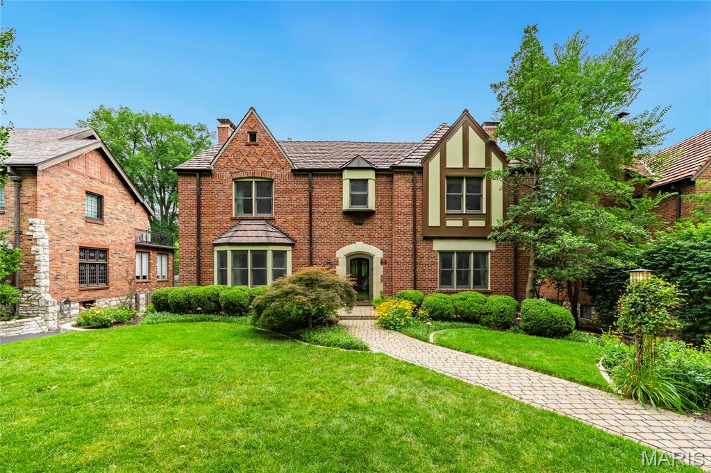 Open Sun, 7/12, 1-3pm. Stunning 2-Story showplace situated on picturesque .28-acre lot in the prestigious Claverach Park neighborhood - Top Rated Clayton Schools. This 5 bedroom - 4 full & 1 half bath home boasts a one-of-a-kind architecturally stunning, open floor plan, designed for today’s living and entertaining, featuring over 6,000 square feet, including the finished lower-level, custom luxury finishes and high-end amenities throughout. 

Walk through the handcrafted front door, into the entry foyer with marble floors, and you will know you are home. Main floor features a formal living room with gorgeous fireplace, and a large, formal dining room, both with exceptional period moldings. 

The gourmet eat-in kitchen is a chef’s dream with custom cherry cabinetry, granite counters, Wolf, Miele and SubZero stainless appliances, Butler’s pantry with 130 bottle wine cooler, and opens to the light filled breakfast room, and a spectacular family room with 10’ wood beamed ceiling, maple hardwood floors, custom built-in entertainment center & work area, with surround sound. 

Upstairs you will find an incredible master retreat with 18’ vaulted ceiling, his & her walk-in closets, sitting room, workout room and laundry room and luxurious master bath with steam shower, double whirlpool tub, his & her sinks, make-up area, commode & bidet, marble floors and built-in speakers, and its own private, custom spiral staircase to the main floor. You will also find 4 more spacious bedrooms and 2 additional full baths, on the 2nd floor. 

Finished lower-level features gas stone fireplace and full bath. Other features include a 2-car oversized garage & stand-alone 1-car garage, home audio system, zoned heater & cooling, Marvin windows and mudroom with dog shower, just to name a few. Relax outside on the upstairs covered deck or on the outdoor living area below, with fireplace and enjoy the beautifully landscaped private backyard that is a gardener’s paradise. This house is perfect for entertaining family & friends. 

Location could not be better – a 5-min walk to downtown Clayton restaurants, coffee shops, galleries, art fair and a 10-minute drive to Washington University, Barnes-Jewish Hospital, Forest Park, and the Delmar Loop. Easy access to major highways, and St. Louis Lambert International Airport!