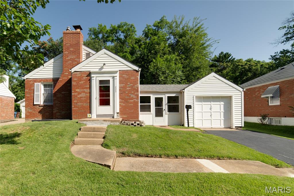 Charming and full of character, this 2-bedroom, 1-bath home features beautifully refinished hardwood floors throughout and timeless built-ins that add warmth and charm. The updated kitchen offers hard-surface countertops and updated stainless steel appliances. Enjoy the convenience of a screened in breezeway connecting to the one-car garage and a fully fenced in backyard perfect for pets, play, or outdoor entertaining. A wonderful blend of classic charm and everyday comfort!
