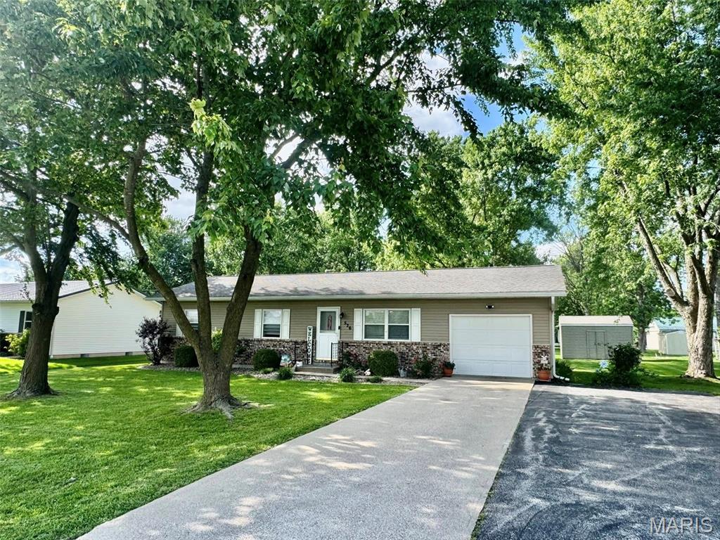 Welcome to the one-stop-shop 3-bedroom home that truly has it all! Instant curb appear from the road and greeted with a slew of interior upgrades as soon as you walk in the door. First steps inside the home lead you to a massive living room, conjoining a spacious eat-in-kitchen where all appliances convey! Down the hallway & throughout you will find updated flooring, your three bedrooms, bathroom, & additional closet space. Step outside to find a well-manicured lawn, attached garage, concrete driveway with additional asphalt parking, a 16x12 shed, & partially fenced-in back yard. Listings such as this do not present themselves often; you already know what to do!