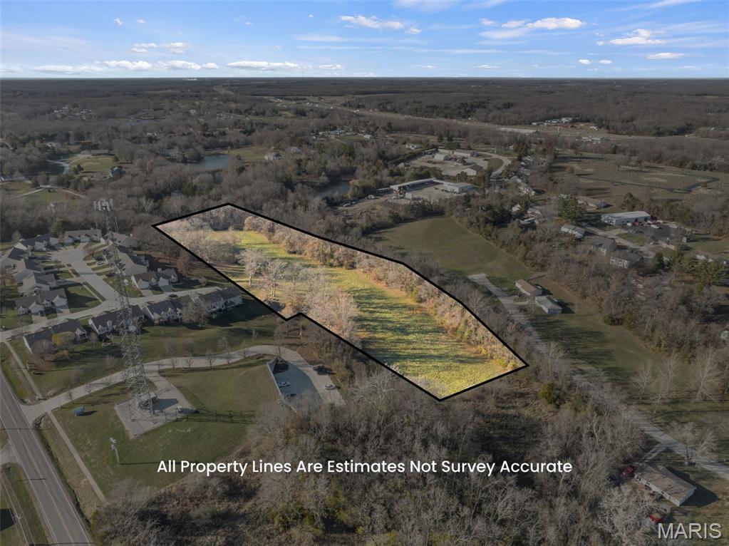 An Investment property for builders and developers! 7+/- acres in the heart of Warrenton within walking distance to Main Street downtown district, dining and shopping. This 7.01 acre property is in city limits, affording you option to connect to city water and sewer.  Minutes from Interstate 70 and conveniently located between Columbia and St. Louis, MO.