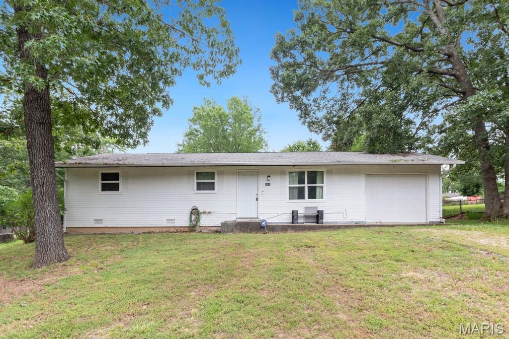 Investment opportunity with plenty of potential! This 3 bedroom, 2 bathroom home offers an open-concept living room and kitchen layout, a convenient mud room located just off the attached 1-car garage, and a fenced backyard. Whether you're looking for your next flip project, rental property, or a home to renovate and make your own, this property offers a great opportunity to build equity. Home is in need of repairs and updates and is being sold as-is. Bring your vision and see the possibilities this property has to offer.