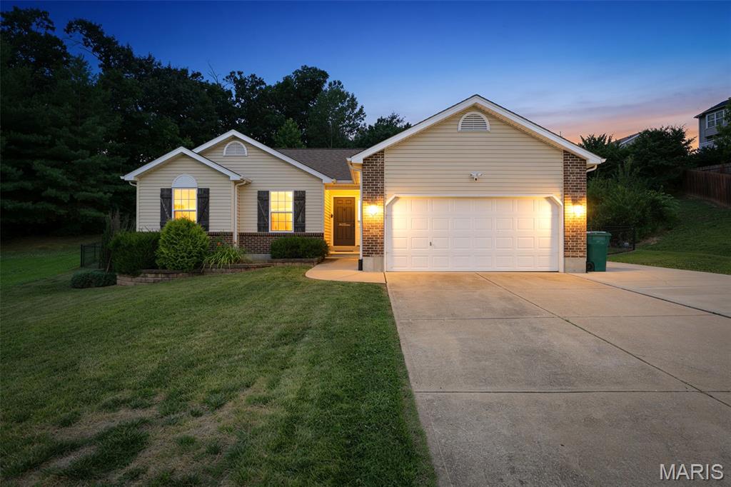 Some houses just feel right the second you pull up, and this is one of them. Step through the welcoming ranch foyer and take it all in: soaring vaulted ceilings, natural light for days, and an airy, connected layout where the kitchen, dining, and living spaces flow together. The kitchen brings the goods with custom cabinetry, stainless appliances, a pantry, and a breakfast bar that spills into the cheerful breakfast room. Engineered hardwood and luxury vinyl tile carry you through the main level, where the laundry lives- right where it should. The primary suite is your private escape, walk-in closet plus an en-suite bath with a double vanity and a tub made for long relaxing soaks. The two spare bedrooms? Updated, adorable, and surprisingly good on space — perfect for guests, kiddos, or that home office you keep talking about. Now for the bonus round: a massive unfinished basement with an egress window and bath room rough-in, totally ready for whatever you dream up! Additional living space awaits;  rec room, home gym, fourth bedroom, and every bit of it builds value! Out back, the fully fenced yard is made for pets, playtime, and lazy weekends under the charming gazebo. Add an extended driveway, 2-car garage, and a peaceful spot at the end of the street, and you've got a home that's move-in ready today with room to grow tomorrow.