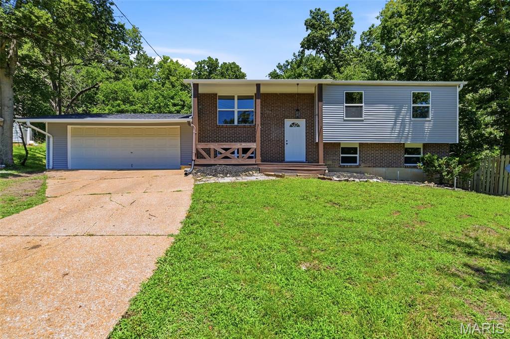 Completely Renovated Split-Level on a Quiet Dead-End Street in Fenton!
Welcome to 25 Apache Trail — a fully rehabbed 3-bedroom, 1.5-bath split-level that's been updated from top to bottom. Tucked away on a peaceful dead-end street, this home offers privacy and curb appeal with all the big-ticket items already done for you.
Step inside to find fresh paint throughout, brand new flooring, and a completely updated kitchen ready for its first home cook. Upstairs, three comfortable bedrooms share a full bath, with a convenient half bath on the main level for guests.
Outside, enjoy a brand new deck perfect for entertaining or relaxing, all under a new roof. New windows throughout bring in natural light while keeping energy costs down.
Move-in ready and worry-free — all the work has been done. Schedule your showing today before this one is gone!