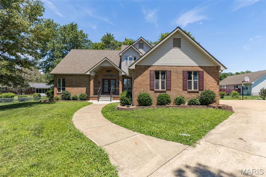A rare opportunity to own a custom house designed and built by the builder for the builder! Traditional two-story brick masonry situated on a quiet subdivision’s choice lot with side entrance, two car garage, extra wide drive, off-street parking and large, fenced backyard. Enter this elegant home through double doors and receive a warm welcome from its charming entry, flanked on each side by bonus rooms suitable as a formal dining and sitting room. Step onto impeccable grade one white oak hardwood floors, the grandeur of vaulted ceilings, with a powder room nearby adding to functionality and ease of living. Take in the open main floor, turn towards a spacious kitchen defining the “Kitchen 3 Rule”, complete with abundant counter space, premium oak cabinetry, island with Jenn-Air cook system, and large pantry. An ample laundry room is nearby. So is an elevated deck with direct access from the kitchen for that morning coffee, outdoor dining or entertaining, rain or shine with a motorized awning. Retrace your steps to the main floor master suite with double sinks, spa-inspired bath, bidet, walk-in shower and closet. Upstairs you will find two bedrooms, Jack-and-Jill bathroom, plus a balcony area. More? Take the steps to the finished lower level, with its walkout to the backyard, discover a large family entertainment center. Two more bonus rooms can serve guest chambers, or office, or home gym. They’re flexible. Need storage space? It’s plentiful here. Supplemental heat keeps the lower level comfy during Missouri’s chilly winter months. No doubt you observed throughout, the rich upgraded finish carpentry, 6 panel solid core doors. You probably detected this home is quiet and comfortable, too. Adding insulated interior walls using 2 x 6’s helps a lot.  

Still want more? It’s move-in ready! Come and see. Call for your personal tour.