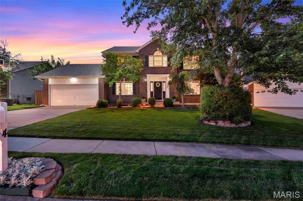 Stop!  This Home Checks All of Your Boxes!  

Welcome to this spacious and beautifully maintained 2-story home in the highly desirable Monticello West Subdivision located in the award-winning Francis Howell School District—this one truly stands out.

With over 3,200 sq ft of thoughtfully designed living space, this 4-bedroom, 3.5-bath home offers a sought-after T-stair floor plan perfect for both everyday living and effortless entertaining. Step inside to find fresh neutral paint, updated lighting, and engineered bamboo flooring throughout the main level, with plush new carpet upstairs.

The open-concept main floor features a spacious great room with a cozy gas fireplace and custom built-ins, seamlessly flowing into the updated kitchen complete with granite countertops, stainless steel appliances, and a sun-filled breakfast room with direct access to the patio—ideal for indoor-outdoor living.

Upstairs, a versatile loft provides the perfect flex space for a home office, reading nook, or additional lounge area. The expansive primary suite impresses with double-door entry and a luxurious en-suite bath featuring dual vanities, a corner soaking tub, a separate shower, and a generous walk-in closet. Three additional bedrooms and an updated full bath complete the upper level.

The finished lower level is built for entertaining—featuring a wide-open rec space and a standout custom bar with concrete countertops, LED backlit shelving, dual beverage and wine refrigerators, and durable LVP flooring.

Outside, enjoy a large, level, fenced backyard—perfect for gatherings, pets, or play—plus access to incredible subdivision amenities including three pools, tennis courts, and a clubhouse.

Ideally located just minutes from downtown Cottleville and a short drive to The District at Chesterfield Valley, you’ll love the easy access to shopping, dining, and entertainment.

Living in O’Fallon means enjoying and being part of a vibrant community with over 450 acres of parks, miles of trails, and top-tier amenities like the Renaud Center and Alligator’s Creek Aquatic Center. From the Katy Trail to year-round community events, this is a lifestyle you’ll love coming home to.