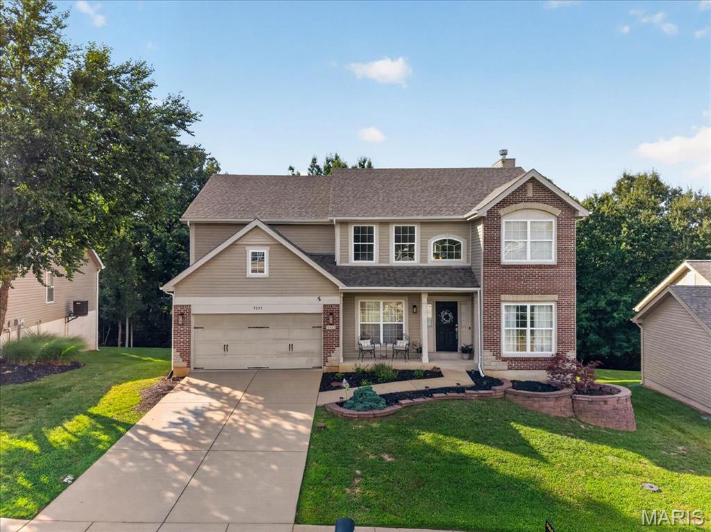 Welcome home to this move-in ready 2-story in the desirable Seckman Estates community! Offering over 2,600 square feet of living space, this newer construction home features 4 bedrooms, 2.5 bathrooms, and a functional layout designed for everyday living.

The main level includes a spacious living room and an eat-in kitchen, both overlooking the peaceful wooded common ground, creating a private, scenic backdrop. The kitchen offers stainless steel appliances, abundant cabinetry, and an adjoining formal dining room for additional entertaining space. An additional flex space offers a main floor home office, playroom, or formal sitting room.  A convenient main-floor laundry room and half bath complete the first level.

Upstairs, you’ll find all four bedrooms, including a generous primary suite with a spacious ensuite bath. The additional bedrooms provide plenty of room for family, guests, or a home office.

Step outside to enjoy the deck overlooking the woods and common ground—a perfect place to relax with your morning coffee or unwind in the evening. Additional updates include a new roof installed in 2025.

Seckman Estates offers wonderful neighborhood amenities, including a community pool, lake and pond for fishing, and is ideally located just minutes from the scenic trails and natural beauty of Mastodon State Historic Site. This home combines space, privacy, and convenience in one exceptional package!