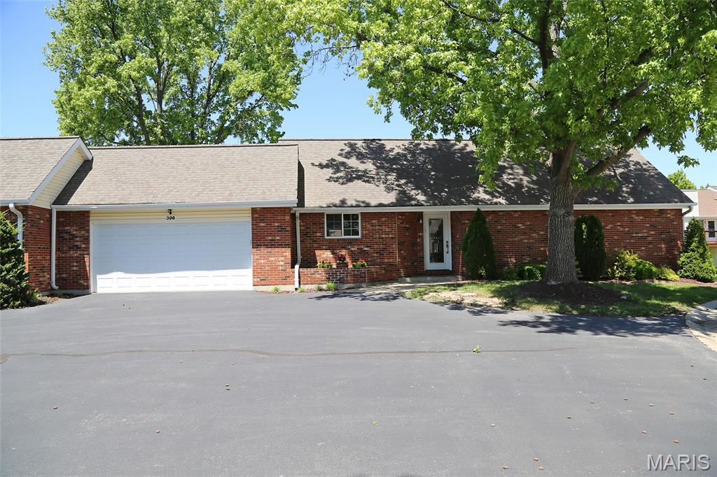 Welcome home to this charming villa offering comfort, convenience, and thoughtful updates throughout. Enjoy the airy feel of vaulted ceilings that span the kitchen, dining, and great room, creating an open and inviting living space. The great room also features a dedicated niche for your electronics, keeping everything neatly organized. The updated kitchen is sure to impress with granite countertops, a glass tile backsplash, deep sink, pantry, and soft-close drawers—plus the refrigerator stays! The spacious primary suite is a true retreat, featuring a large bedroom, a generous walk-in closet, and a private bath complete with a newer vanity and an oversized shower. The secondary bedroom provides flexibility with a built-in Murphy bed—perfect for guests or a home office—while the updated hall bath just across the hallway adds both style and convenience. Additional highlights include durable vinyl plank flooring, a main-level laundry room with electric dryer hookup, and an oversized one-car garage. Step outside to relax or entertain on the wood deck. The full, unfinished basement offers endless potential with a rough-in for a future bath and a utility sink already in place. Ideally located close to shopping, hospitals, and major highways, this villa combines low-maintenance living with convenience and style. Don’t miss your opportunity to make it yours!