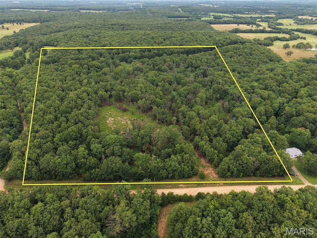 Discover 19.81+/- acres of beautiful Missouri countryside with endless possibilities! This tract offers county road frontage on Robin Drive, a nice mix of mature timber and open clearing, and electric available at the road. Whether you're looking for a private homesite, recreational retreat, hunting property, or an investment in land, this property offers the space and seclusion to make your vision a reality. Enjoy the peace of rural Laclede County while still being within a reasonable drive of nearby communities. This property is a blank canvas for your future plans. Come explore everything this beautiful acreage has to offer!  Measurements are approximate.