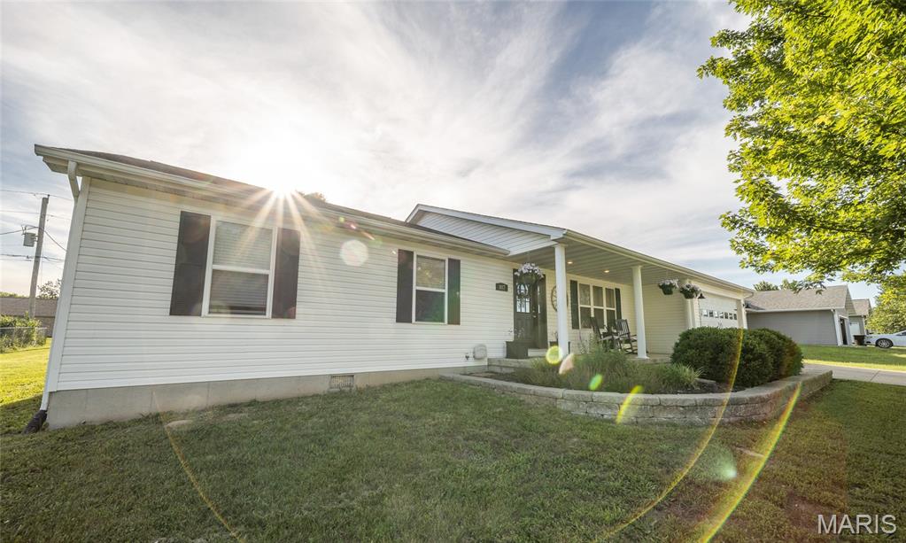Welcome to this beautifully remodeled and decorated 3-bedroom (possible 4th), 2-bath home nestled in the newer neighborhood behind St James Winery! This move-in-ready property offers the perfect blend of comfort, style, and functionality. A welcoming front porch with lovely landscaping creates the ideal spot to relax and unwind. Inside, you'll find bright and inviting living and dining spaces, along with a separate kitchen featuring a stunning hammered copper double sink that adds unique character and farmhouse charm. The spacious primary suite includes a private bath with a matching hammered copper double vanity, while two additional bedrooms offer flexibility for family, guests, or a home office. A large bonus room provides even more living space or an additional bedroomn and opens directly to the back deck and peaceful outdoor sitting area—perfect for entertaining, grilling, or enjoying quiet evenings at home. Recent updates include beautiful new flooring throughout, newer appliances, updated sinks, faucets, countertops, a brand-new fireplace, and a roof replacement - all done 2023-2024. Whether you're searching for your first home, room to grow, or simply a place that's ready to enjoy from day one, this property checks all the boxes. Schedule your private showing today!