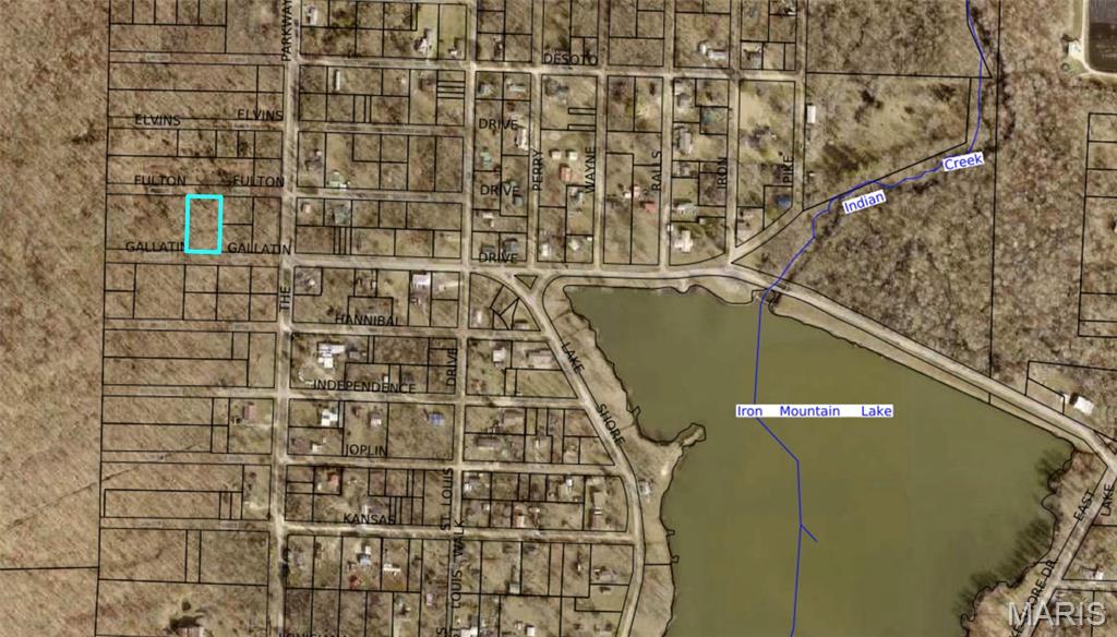 Looking for an affordable land investment or lake-area project? This .55-acre parcel in Iron Mountain Lake offers flexibility, privacy, and access to one of southeast Missouri’s most unique recreational communities. Consisting of 12 individual platted lots, the property was originally designed with a trailer court layout in mind but could just as easily serve as a single home site, small development, or private weekend retreat.

A basic road has been blazed in along the south side on Gallatin Drive, providing preliminary access for viewing and future improvements. While utilities are available nearby, they are not yet connected. Buyers should contact Iron Mountain Lake Administration for details on access, utility connections, and property use.

Located within the Iron Mountain Lake community, residents enjoy over 76 acres of lake water for boating, fishing, and swimming—plus a quiet, natural setting perfect for outdoor enthusiasts. Whether you’re planning to build, invest, or simply enjoy recreational lake access, this property offers outstanding potential at an affordable price.

Discover the possibilities and secure your piece of Iron Mountain Lake today!