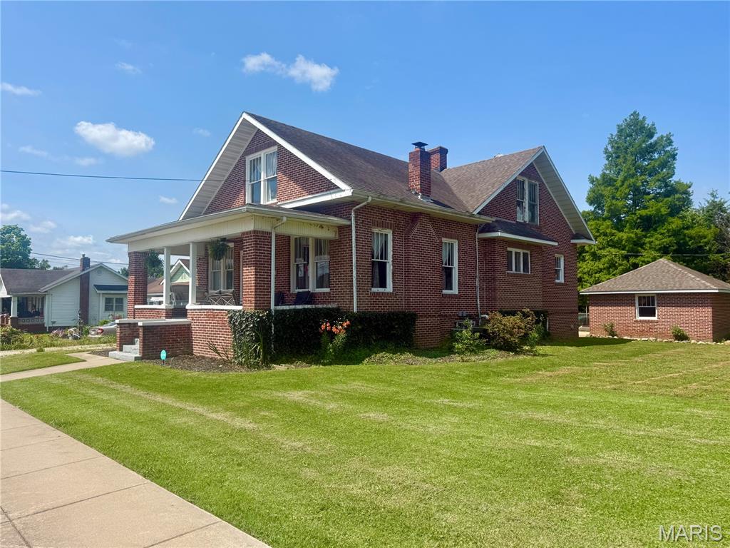 Welcome home to this charming and spacious 5-bedroom, 2-bath all-brick two-story residence located in the heart of Fredericktown, Missouri! Bursting with character and timeless appeal, this well-maintained home offers the perfect blend of classic charm and modern updates, making it an excellent opportunity for first-time homebuyers, growing families, or anyone seeking extra space. Step inside and you’ll immediately appreciate the beautiful natural hardwood flooring that flows throughout much of the home, along with charming built-in cabinetry and accent features that add warmth and personality. The functional floor plan offers two bedrooms and one full bathroom on the main level, while the upper floor features three additional bedrooms and a second full bathroom, providing plenty of room for family, guests, or a home office setup. The spacious master bedroom offers a comfortable retreat, while the recently remodeled bathroom (updated in 2024) provides modern style and convenience. The kitchen comes complete with all brand-new appliances, and the sellers are also including the washer and dryer with the sale, making this home truly move-in ready. Outside, you’ll find a gardener’s paradise! Enjoy established flower beds, abundant natural berries, mature grapevines, and dedicated gardening areas throughout the property. The spacious backyard provides plenty of room for outdoor activities and entertaining, while the chain-link fencing offers security and peace of mind. A detached one-car garage adds additional storage and convenience. Relax on either the covered front porch or the covered rear porch, perfect for enjoying your morning coffee or unwinding in the evening. Additional features include main-floor laundry, a full unfinished basement ideal for storage, a newer water heater, updated thermostat, and a new condenser coil on the AC unit. For added peace of mind, the sellers are offering a transferable home warranty, and to top it all off, a brand-new roof will be installed prior to closing! If you’ve been searching for a home that combines character, space, updates, and outdoor charm, this Fredericktown gem deserves a spot at the top of your list. Schedule your private showing today before this incredible opportunity is gone!