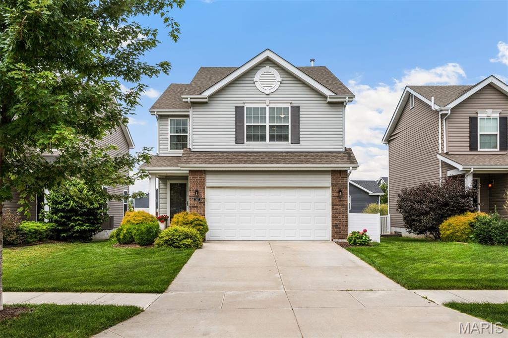 Welcome home to this gorgeous 2-story home in the desirable Charlestowne Place community featuring 3 bedrooms and 2.5 baths, perfectly designed for comfortable living and entertaining. The open floor plan offers a bright and spacious feel, seamlessly connecting the family room with the kitchen and breakfast room. The family room features a cozy electrical fireplace, which will add warmth and ambiance to those cold winter nights. The kitchen features stainless appliances, 42-inch cabinets, a pantry, timeless white subway tile backsplash, a stainless French door refrigerator that stays with the home, and a porcelain glazed single bowl sink that will make you look forward to doing dishes! The powder room has been updated with tons of personality, featuring beautiful wallpaper, tile flooring, a pedestal sink, an updated faucet, and updated lighting. It is a space that is sure to leave your guests talking! Upstairs, you will find two bedrooms, a full hall bathroom, and the outstanding primary suite. Complete with a sophisticated accent wall, two massive walk-in closets, a spacious bathroom with marble hexagon tile, a linen closet, and a double sink vanity, the primary suite will be your private sanctuary! Step outside onto your spacious patio to enjoy the level and fully fenced backyard, an ideal setting for outdoor gatherings, play, or relaxation. Garden enthusiasts will love the established garden area, offering a peaceful retreat and space to grow your favorite flowers, herbs, or vegetables. The unfinished basement features an egress window and a rough-in for a bathroom, which could be finished to add great additional living space if needed! Just minutes from Highway 370, you’ll have easy access to dining, shopping, and parks plus you have the charming New Town community just around the corner! Don’t miss the opportunity to make this beautiful home yours!