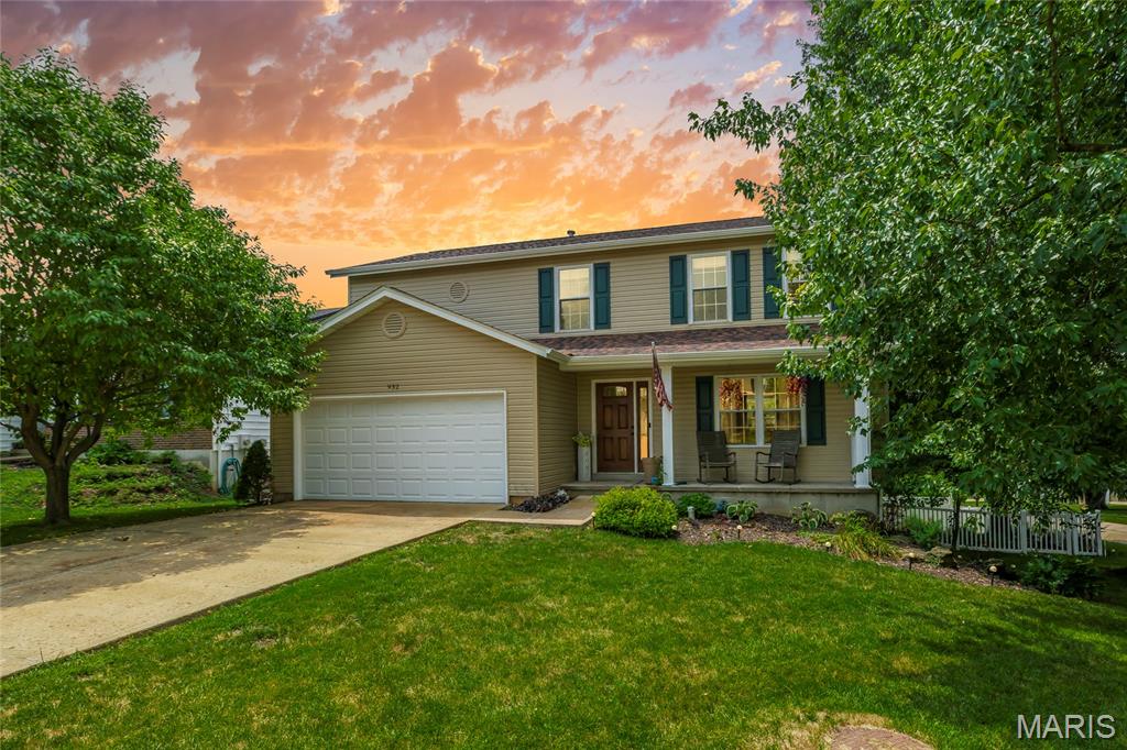 Imagine starting your mornings with a cup of coffee overlooking your own private backyard retreat, where peaceful pond views, lush landscaping, and the relaxing sounds of the waterfall create the perfect escape from the everyday. Welcome home to this beautifully maintained 2-story, 4-bedroom, 3-bath home in the heart of Arnold, where every space has been thoughtfully updated and meticulously cared for.

Step inside to warm hardwood floors and an inviting living room centered around a cozy fireplace—perfect for gathering with family or relaxing after a long day. The beautifully updated kitchen features crisp white cabinetry, granite countertops, stainless steel appliances, and a gas range, making it equally suited for hosting friends or preparing weeknight dinners.
The outdoor living space is truly the heart of this home. A maintenance-free composite deck (2023) overlooks the private backyard oasis complete with a tranquil pond, mature landscaping, a beautiful paver patio, and room to unwind in every season. Whether you're entertaining guests, enjoying summer evenings, or simply taking in the view, this backyard offers a setting that's hard to find.

Upstairs, you'll find four spacious bedrooms with brand-new carpet (2026), including a comfortable primary suite featuring a walk-in closet and private en-suite bath, along with an additional full bath for family or guests.

The finished walk-out lower level provides even more flexible living space with a large recreation room warmed by a gas fireplace/ stove, a dedicated office complete with a unique built-in aquarium, and direct access to the backyard patio—ideal for working from home, hobbies, or movie nights.

You'll also enjoy the confidence that comes with extensive recent improvements, including a high-efficiency Lennox HVAC system (2023), new attic insulation (2021), a storage shed (2022), and brand-new siding, roof, gutters, gutter guards, and shutters (2025).

This is the kind of home where memories are made and weekends are enjoyed. With the major updates already completed, all that's left to do is move in, settle in, and enjoy everything this exceptional property has to offer.