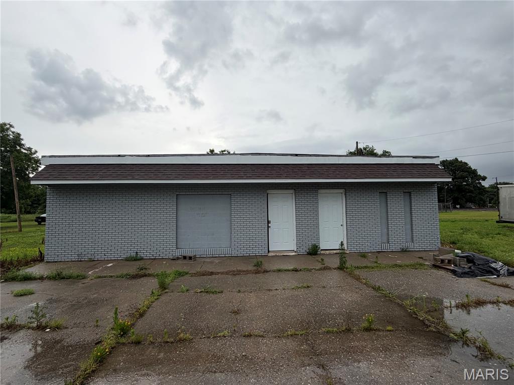 Unique redevelopment opportunity! This 2,244 sq. ft. multi-use building offers endless potential for investors, entrepreneurs, contractors, or those seeking a custom renovation project. Formerly configured as a duplex with two separate entrances, the structure has been gutted to the studs, providing a blank canvas for your vision. The walls remain standing, allowing you to reimagine the layout for residential, commercial, mixed-use, office, retail, rental units, or other permitted uses. The electric service has already been updated, helping reduce future improvement costs. Conveniently located with excellent accessibility, this property is ready for transformation and value creation. Bring your ideas and unlock the possibilities!