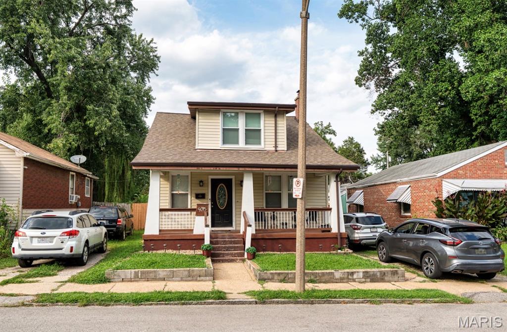 Welcome to 4015 Eichelberger, a spacious and well-maintained South St. Louis home offering the perfect blend of classic charm and modern updates. Step inside to find an inviting open living and dining area featuring original hardwood floors, crown molding, abundant natural light, and an open staircase that creates a warm, welcoming atmosphere.

The updated kitchen is equipped with white cabinetry, granite countertops, stainless steel appliances, a stylish tile backsplash, and plenty of cabinet and prep space. The renovated bathroom features floor-to-ceiling tile, a glass block accent wall, and a relaxing jetted soaking tub.

Upstairs you’ll find generously sized bedrooms with ample closet space, while the full basement offers abundant storage, laundry area, and endless possibilities for a workshop, home gym, or future finished living space.

Outside, enjoy the covered front porch, oversized, level backyard, and detached garage with alley access. The deep lot provides plenty of room for entertaining, gardening, pets, or future outdoor improvements.

Conveniently located near parks, restaurants, shopping, and major highways, this move-in ready home offers space, character, and value in one of South St. Louis’ most established neighborhoods. Schedule your private showing today!
