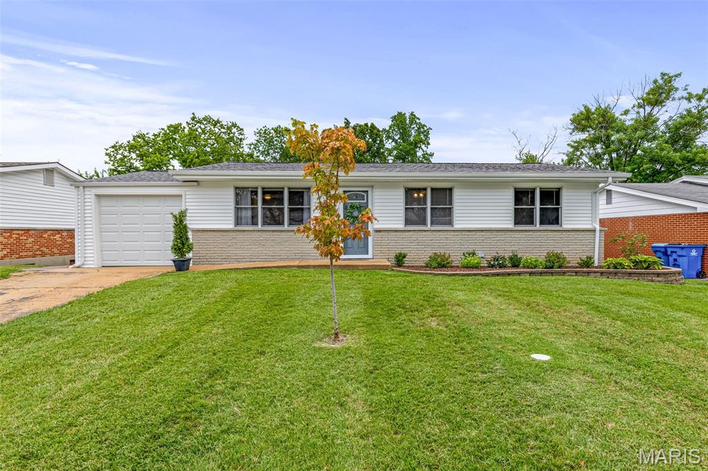Show-stopping and move-in ready! This beautifully updated 3-bedroom ranch in the heart of South County offers the perfect blend of style, comfort, and convenience. From the moment you arrive, you'll appreciate the pride of ownership and extensive updates throughout.

Step inside to discover gleaming hardwood floors spanning most of the main level, newer Pella windows, fresh neutral paint, elegant six-panel doors with oil-rubbed bronze hardware, taller base trim, and recessed lighting that brightens the inviting living room.

The updated kitchen is sure to impress with 42-inch custom cabinetry, a stylish tile backsplash, and stainless steel appliances, creating the perfect space for preparing meals and entertaining guests.

Need additional living space? The partially finished lower level offers a spacious L-shaped family/game room, plus a private home office or possible sleeping area, giving you plenty of flexibility to fit your lifestyle.

Step outside and enjoy your own backyard oasis! The huge level, fenced yard is ideal for summer BBQs, yard games, pets, or gatherings with family and friends. Relax on the large deck, entertain on the adjacent concrete patio, and enjoy the convenience of a utility shed and attractive stone planter beds.

Additional updates include a newer roof, updated electrical panel, newer siding, insulated overhead garage door, and so much more. Don't overlook the extra-deep one-car garage, providing exceptional storage and workspace.

Conveniently located just minutes from county parks, highways, shopping, restaurants, and everyday amenities, this home truly checks all the boxes. Homes this updated in such a desirable South County location don't last long—schedule your private showing today!