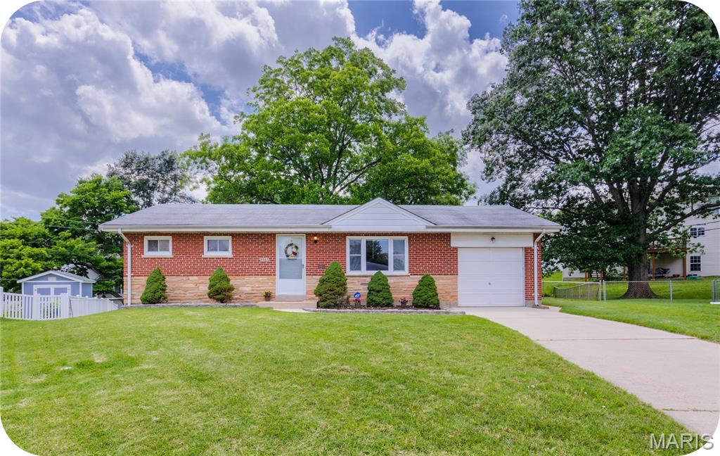 This ranch is truly affordability at its finest! Step inside to the open living and dining room that features original hardwood floors. The spacious kitchen is ready for your cosmetic upgrades, but has plenty of room to make it a dream kitchen-- especially with the picture window overlooking the backyard. Two good sized bedrooms and a full bath (with original tile) fill the rest of the main floor. An attached 1-car garage makes life super convenient! The spacious basement adds so much space for storage, a workout area, etc. Head out back to the HUGE backyard with a nice patio. This space is ready for you to enjoy for the rest of summer-- grill out with friends, play yard games, add garden beds-- so many possibilities!