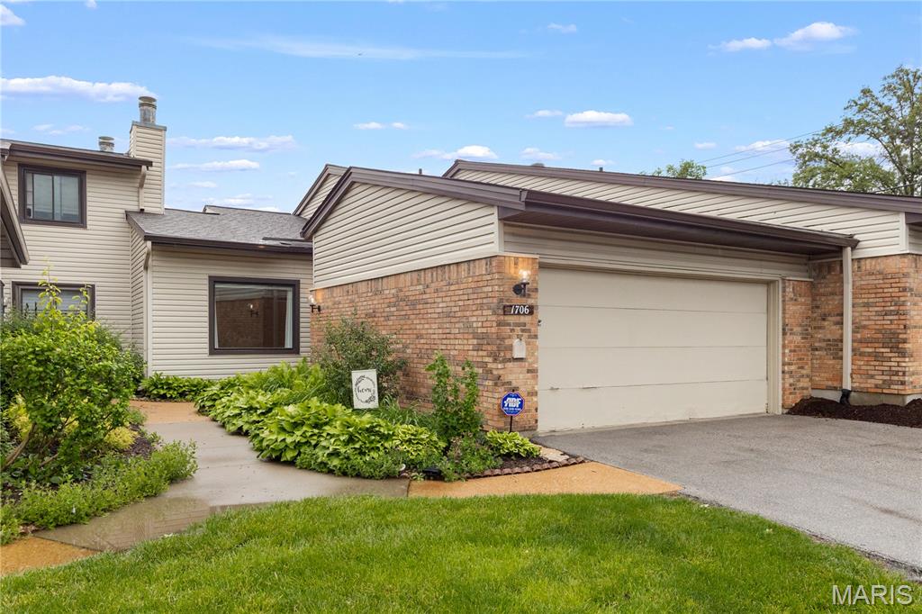 WELCOME to 1706 Heather Dale Drive!  Have you been looking for the convenience of condo living with the feel and space of a home?  Does that dream home have almost 1,600 square feet just on main floor AND a main floor laundry to boot?  It has a 2-car garage.  A pool you can walk to within minutes?  Neighbors that play pickleball?  A backyard PLUS a separate finished lower level for overnight guests? Tons of additional storage?  TA-DA!  You've found it!  Look no further.  This Agent/Owned ranch home/condo was renovated top to bottom in 2019 making it move-in ready.  The main floor has a beautiful kitchen featuring white shaker Thomasville custom cabinetry paired with granite counters and a gleaming gray backsplash.  You will simply love the versatile built-in pantry to the right of the large stainless Whirlpool Gold side-by-side refrigerator.  The double oven is a nice surprise.  Adjacent to the kitchen is the open living room/dining room area with a gas fireplace, 11-foot ceilings, and the lovely walnut colored LVP/Luxury Vinyl Plank flooring that run throughout both the main floor and the finished basement, as does the 5 1/4-inch baseboards.  Let's not forget the MAIN FLOOR LAUNDRY!  Completing the main floor are 3 bedrooms, of which the Primary bedroom is beyond HUGE, and 2 bathrooms.  The Primary bedroom has a walk-in closet plus an en suite.  The two additional bedrooms are good size with ceiling fans in both.  The hall bathroom has a tub shower combo for convenience.  A linen closet is located in the hall for ease of accessibility.  NEW windows/sliding glass doors throughout-2019.  Yes, it does have a 2-car garage!  Walking downstairs to the basement/aka finished lower level, the landing saves interior space while dividing your trip downstairs.  The finished WALK-OUT lower level boasts approximately 1,000 square feet of additional living space.  This includes a 3rd full bathroom (guests have their own potty!), a spacious family room with a bonus room that could be a home office, sleeping area or both.  Walk-out the sliding glass door to your fully fenced in backyard.  Whoot!  Whoot!  Hello green space.  Let's not forget about the unfinished portion of the basement.  This immensely large storage room has sturdy built-in shelving for alllll your holiday totes.  To review, the home was renovated in 2019, which included a new kitchen, 3 new bathrooms, new flooring throughout, new lighting, new baseboards, new 2 panel doors, new front door/storm door/side light, all new windows, 2 new sliding glass doors and new window coverings.  Whew!  Let's not forget about the community.  Westport Crossing Condominiums (WCC) is centrally located in unincorporated St. Louis County = 63146.  The community features a robust association of 302 units.  The POOL is minutes away, as are the tennis/pickleball courts.  Meet neighbors at either of these locations or at the clubhouse during Game Night.  SEE YOU AT THE OPEN HOUSE!  NOTE:  St. Louis County Occupancy Inspection TBD.  Sellers will provide a CHOICE Home Warranty which covers systems, appliances, etc... Sellers will close with Investor's Title Company.  Agent/Owned.  *NOTE:  The use of grills is not allowed per the community insurance provider.