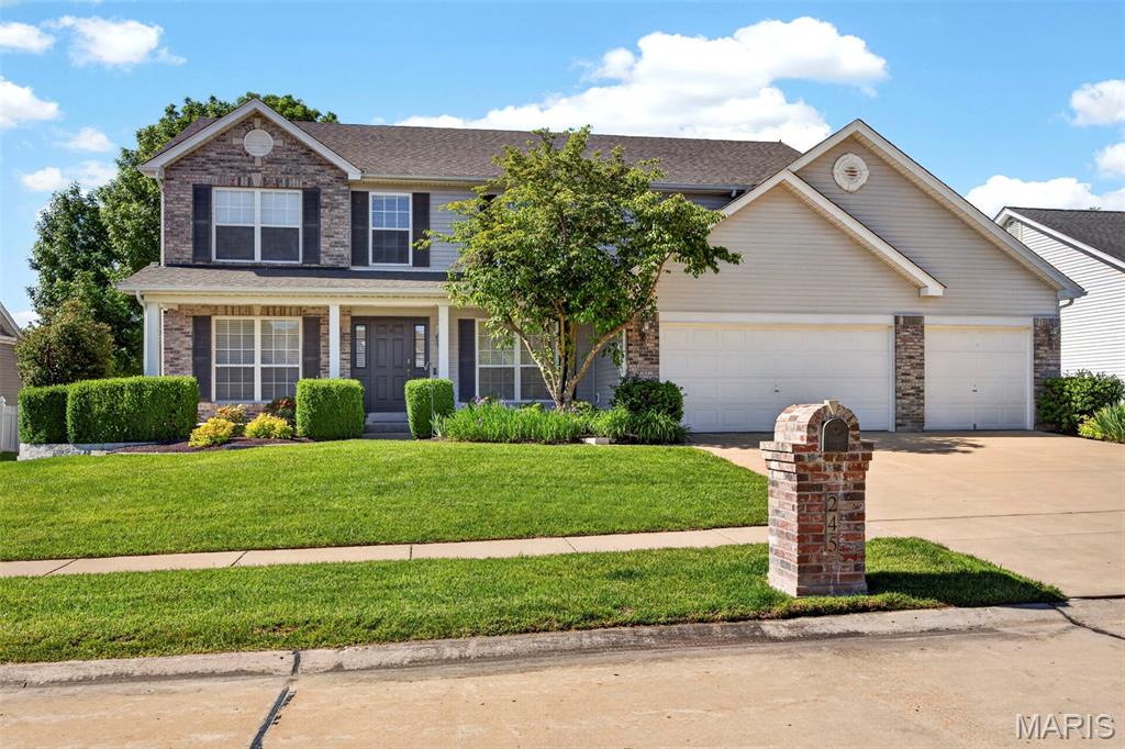 Welcome to 245 Strathmoor Way in O’Fallon.
From the moment you step inside, this home feels spacious, polished, and easy to imagine as home. The slate tile entry makes a memorable first impression, with a private office on one side and a formal dining room on the other. Both are generously sized, giving you room for work, hosting, hobbies, or whatever life calls for.
Continue through the main level and the dark hardwood floors lead you into a large family room with a wood burning fireplace. The staircase sits toward the back of the home, creating a natural division between the family room and the breakfast room and kitchen. It gives the main level a sense of openness while still allowing each space to feel defined.
The kitchen is ready for everyday life, with a walk in pantry and an easy connection to the breakfast area and living space. Just off the kitchen, you’ll find the laundry room, half bath, and access to the three car garage.
Upstairs, a spacious bonus room greets you at the top of the stairs and gives you a true second living area. To the left, the primary suite is expansive, with a massive custom walk in closet with built in storage and an equally generous and recently updated bath featuring a soaking tub, separate shower, and double vanity
Off the bonus room, three additional bedrooms each offer generous space and their own walk in closets. A well-appointed and newly remodeled hall bath serves the secondary bedrooms.
The lower level is large, clean, and ready for future finishing, with a bathroom rough in already in place.
Out back, the fully fenced yard and inviting patio create an easy place to relax, grill, entertain, or enjoy a quiet evening at home.
With 3,096 square feet, a .23 acre lot, and a three car garage, this home offers the space, storage, and layout you're looking for without sacrificing warmth or welcome.