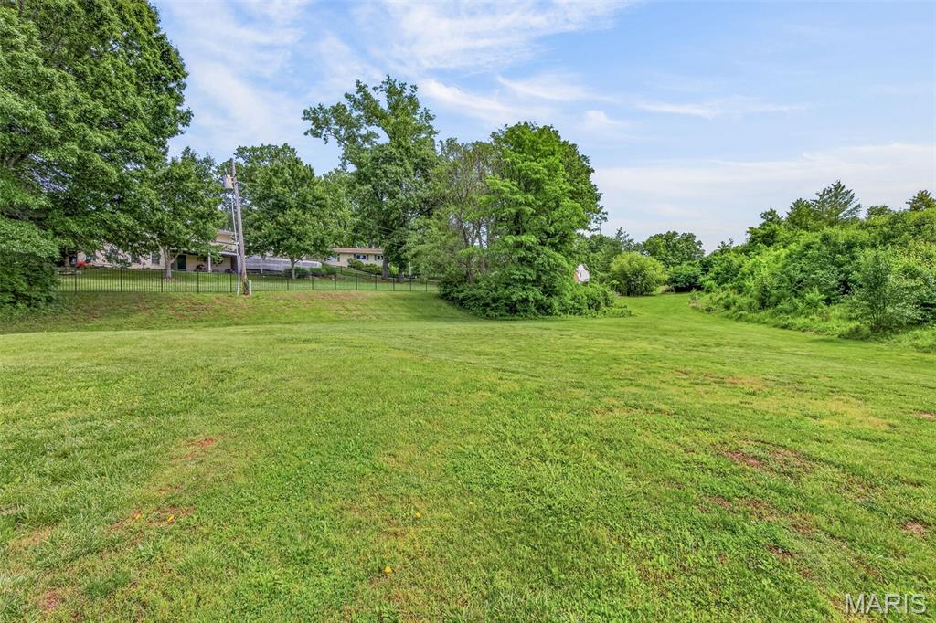 Exceptional opportunity to build new construction in the highly sought-after Parkway School District, conveniently located just off Highway 141 and Manchester Road! Situated on a spacious .43-acre corner lot at the end of a quiet street, this property offers incredible potential for your custom dream home. The peaceful setting provides added privacy while still being close to shopping, dining, parks, and major commuter routes. City Planning & Zoning officials are available for questions and are already familiar with the lot, making the building process even smoother. Don’t miss this rare chance to create something special in a prime location!