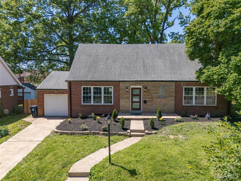 Welcome to University City! This beautifully updated 1.5 story 3 bedroom, 2 full bath & 2 half bath home is nestled in a quiet neighborhood on a desirable corner lot. Enjoy outdoor living with a level privacy-fenced backyard, covered patio, 1-car garage, and additional driveway parking. Inside, you’ll find custom cabinetry, stainless steel appliances, solid surface countertops, refinished hardwood flooring, fresh neutral paint, updated bathrooms, and stylish lighting throughout. Main floor primary with updated half bath is perfect for those not intersted in stairs or looking for a divided bedroom floor plan. The partially finished lower level offers a wet bar, added living space, and plenty of storage. Seller is offering a 1 year home warranty from Choice Home Warranty! Located within walking distance and view of sought-after University City Schools, local parks, dining, and entertainment. More than just a home — this is a community you’ll love being part of!