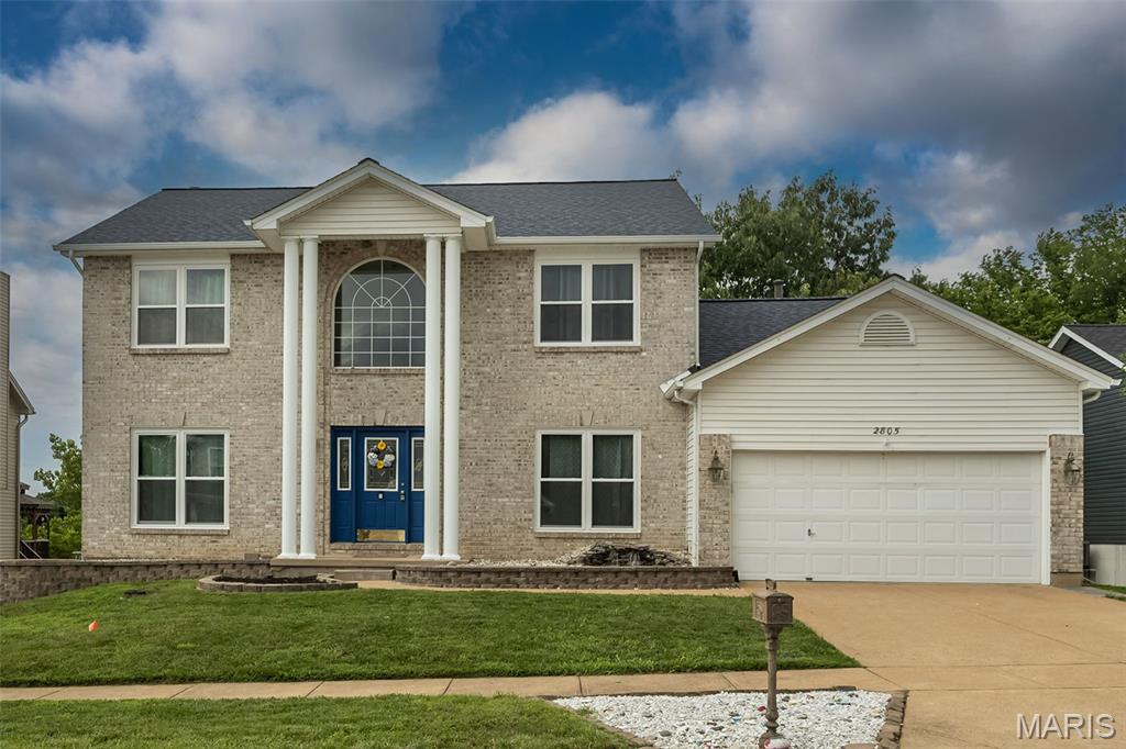 Beautiful two-story brick home featuring a 2-car garage and an inviting floor plan. The main level offers a formal living room, formal dining room, and a spacious great room with a cozy fireplace. The large kitchen is perfect for everyday living and entertaining, complete with a center island, pantry, and breakfast area.

Convenient main-floor laundry adds to the home's functionality. Upstairs, you'll find 4 generously sized bedrooms, including a spacious primary suite with dual walk-in closets. The primary bath features double sinks, a separate soaking tub, and a walk-in shower.

Step outside to a large deck overlooking a beautiful tree-lined backyard, ideal for entertaining or relaxing in a private setting. The walk-out lower level includes a rough-in for a future bathroom and offers a blank canvas ready for your personal touch and finishing ideas.  
Wonderful neighborhood close to shopping and restaurants.  A must see!

We have a PASSED Rock Creek Fire Inspection and a PASSED City of Arnold Inspection