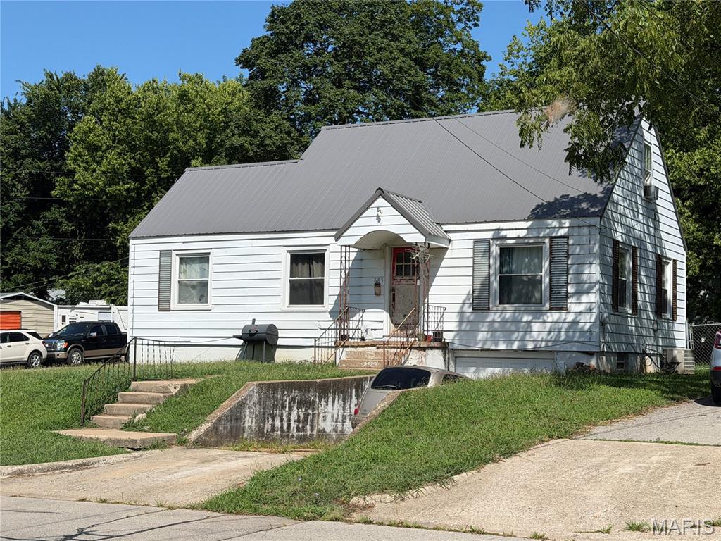 ATTENTION INVESTORS!!!!
This house some age on it, but has good bones.  Needs updating, floor covering, paint etc.  Great investor purchase or a  buyer that can fix up on their own.  Home features 3 bedrooms, 1 bath, 1 car garage in partial basement. two living areas one features fireplace(currently capped) with knotty pine walls, dining room and kitchen with lots of cabinets.  upstairs is full width of house and used as 3rd bedroom.  Nice fenced backyard.  Partial basement is unfinished and a great place for storage or workshop.  Metal roof is approximately 10 years old, windows were update approximately 20 years ago.
