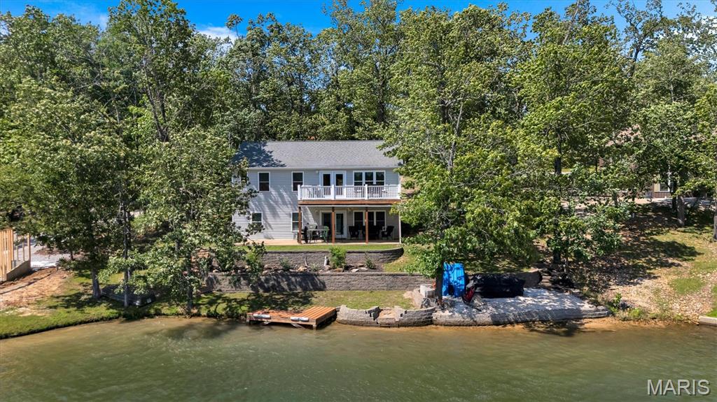 This 4-bedroom, 3-full-bath lakefront ranch home in Lake Perry offers over 2,200 square feet of living area with a layout designed for flexibility, comfort, and easy everyday living. Main level living convenience includes an open kitchen, dining and living room, perfect for entertaining. Spill out onto the composite deck for morning coffee, evening beverages or holiday fireworks. Enjoy the fantastic lake view.  Laundry room, too!  The main level primary suite includes a private full bath, while the lower level adds 2 additional bedrooms and 1 full bath, making this property well suited for guests, multi-generational living, or work-from-home needs.
Inside, the ranch-style floor plan offers practical separation of space with main-level living and an expanded finished lower level that increases usable square footage and everyday functionality. Buyers looking for extra sleeping areas, recreation space, hobby space, or a private lower-level setup will appreciate the versatility of the finished basement. The composite deck extends the living space outdoors and provides a durable, low-upkeep area for relaxing, dining, or gathering with friends and family. Combined with the updated HVAC, the home offers a strong mix of comfort, usable space, and important improvements.
Located in the community of Lake Perry, this property stands out for its easy access to the lake, a major advantage for buyers seeking a full-time residence, weekend getaway or vacation home with water-oriented lifestyle benefits. Enjoy convenient access to boating, fishing, kayaking, and scenic lake days, along with neighborhood amenities:  Relax by the sparkling community swimming pool, soak up the sun on expansive sandy beaches, challenge friends to a game of sand volleyball, or spend quality time at the modern playgrounds. Take advantage of the dedicated marina loop, seasonal on-site dining and food trucks, spacious public pavilions for gatherings and celebrations, plus convenient shower and laundry facilities. This Perryville property combines the appeal of a lake community, the convenience of nearby amenities, and the everyday ease of a ranch home with finished lower level.

Video: https://youtu.be/f98KaocA4L8