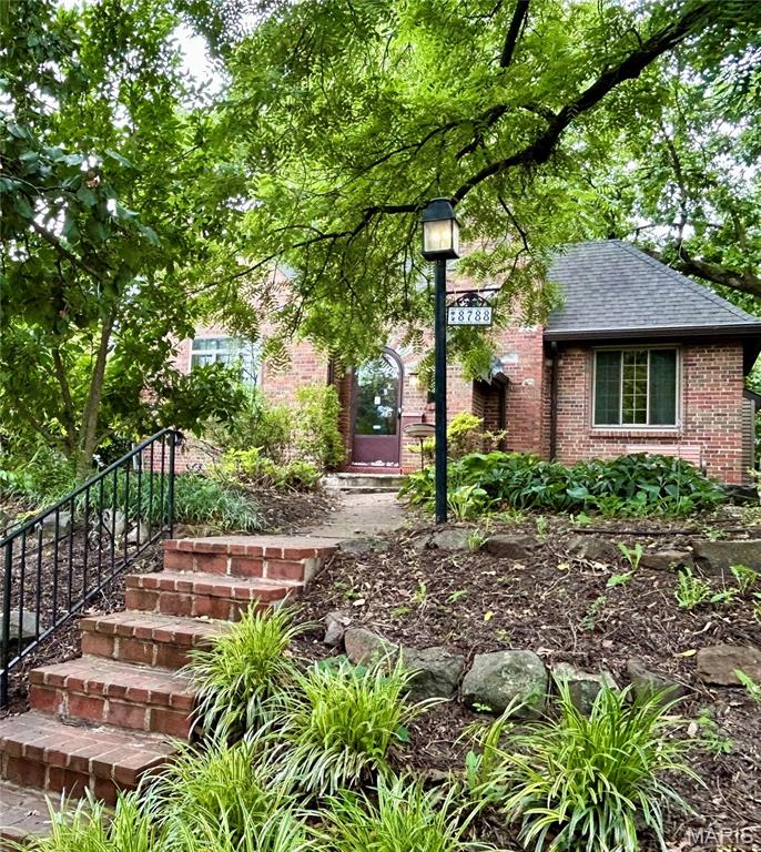 Charming 100-Year-Old Home Full of Character and Craftsmanship
Step into this charming century-old home featuring exquisite original woodwork and timeless architectural details throughout. The stunning living room showcases beautiful wood flooring, a wood-burning fireplace, and a spectacular handcrafted wood ceiling with decorative hand-painting and stenciling on arched architectural wood beams. A newer window brings in abundant natural light while highlighting the room's unique character.
The formal dining room continues the home's warm appeal with wood flooring and exposed wood beams, creating the perfect setting for family dinners and entertaining.
The spacious primary bedroom features an exact replica of the impressive wood-beamed and stenciled ceiling found in the living room, along with two large windows that fill the room with natural light. A second bedroom offers hardwood flooring and a large window overlooking the level, fenced backyard.
The hall bathroom includes a convenient tub/shower combination. The kitchen is equipped with custom wood cabinetry, an electric range, dishwasher, and refrigerator, providing both functionality and charm.
A large sun room or den offers generous windows and plenty of natural light, creating a versatile space for relaxing, working, or entertaining. Just a few steps away walk outside, enjoy the inviting porch complete with a wood-burning fireplace. The back yard and front yard features natural landscaping with no grass to mow, making outdoor maintenance a breeze.
Additional features include a one-car garage and basement, providing ample storage and utility space. This one-of-a-kind home combines historic craftsmanship, unique architectural details, and comfortable living spaces in a truly special setting. Want more....Right in your very own neighborhood walk to the Memorial Park in Brentwood with walking trails and playground for the kids. Walk to shopping, restaurants and the mall. In the middle of everything you need and minutes from everything else! You will love this home!