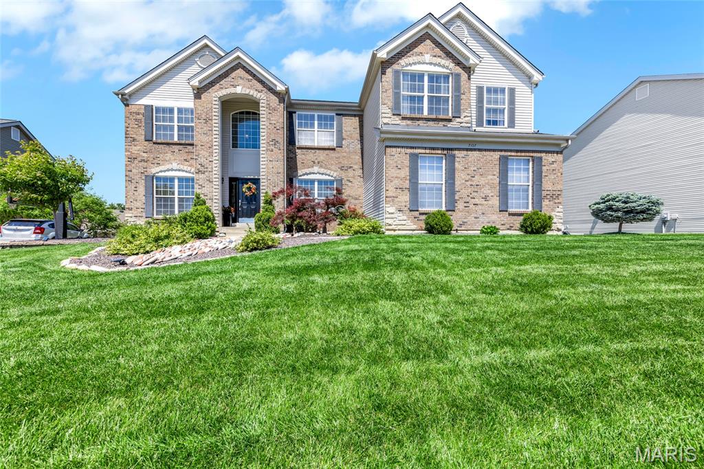 Don’t miss this beautiful 5-bedroom, 3.5-bath home in Wentzville offering over 4,300 square feet of living space across two stories — giving you all the room you need to spread out, entertain, work from home, or grow into the space for years to come.

The main level features hardwood floors, an open-concept layout, and a kitchen designed for both everyday living and hosting — complete with granite countertops, a large center island, updated cabinetry, a walk-in pantry, and a dining area that opens directly to the backyard patio. The family room is filled with natural light and centered around a cozy gas fireplace. Also on the main level, you’ll find a formal dining room, a private study with floor-to-ceiling built-in bookshelves, and a fifth bedroom that offers flexibility for guests, multigenerational living, or a home office.

Upstairs, the spacious primary suite includes a private ensuite bath and two oversized walk-in closets. Two additional bedrooms are connected by a Jack-and-Jill bathroom, while another upstairs bedroom features its own private ensuite bath. A large bonus room with built-in shelving provides even more flexible living space — perfect for a playroom, media room, second office, or workout area. Every bedroom includes a walk-in closet, giving everyone plenty of storage.

Step outside to enjoy the expansive deck and patio surrounded by beautiful landscaping — an ideal setup for relaxing evenings, entertaining guests, or enjoying the outdoors year-round.

SHOWINGS START AT THE OPEN HOUSE ON 5/17. NO SHOWINGS PRIOR TO OPEN HOUSE