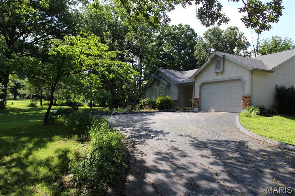Spacious ranch on 6 gorgeous acres conveniently located just minutes from wineries, schools, shopping and highways!  This charming 3 bedroom, 2 bath home comes complete with main floor laundry, full, unfinished basement, and a primary bedroom with walk-in closet and ensuite bath.  Besides the 2-car attached garage, there is a 28’x60’ insulated metal outbuilding with concrete floor, electric and 220 AC.  Lots of deer and other wildlife on the wooded acreage.  Some fresh paint and flooring will make this a rural oasis while still being just minutes to town conveniences.  Being sold As-Is.  Call Sherry for details.  Interior pictures coming soon.