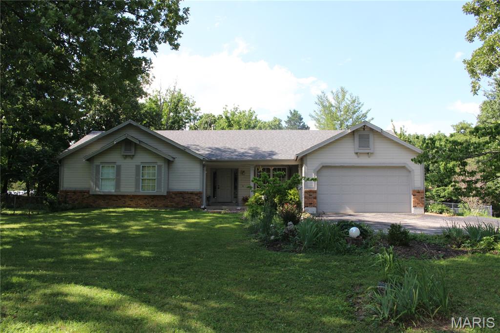 Spacious ranch on 6 gorgeous acres conveniently located just minutes from wineries, schools, shopping and highways!  This charming 3 bedroom, 2 bath home comes complete with main floor laundry, full, unfinished basement, and a primary bedroom with walk-in closet and ensuite bath.  Besides the 2-car attached garage, there is a 28’x60’ insulated metal outbuilding with concrete floor, electric and 220 AC.  Lots of deer and other wildlife on the wooded acreage.  Some fresh paint and flooring will make this a rural oasis while still being just minutes to town conveniences.  Being sold As-Is.  Call Sherry for details.  Interior pictures coming soon.