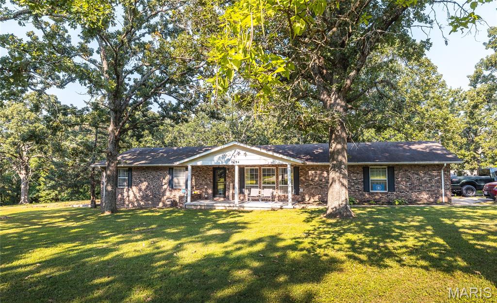 Welcome to the perfect blend of modern updates and small-town charm in the heart of Dixon, MO! Situated on a spacious 2.14-acre corner lot, this beautifully remodeled 3-bedroom, 2-bath home offers the space you've been looking for with the stylish finishes today's buyers love. From the moment you arrive, the inviting covered front porch sets the tone for relaxed country living. Step inside to discover a thoughtfully updated interior where every detail has been refreshed to create a move-in-ready home. At the center of it all is the stunning kitchen, featuring sleek granite countertops, a custom center island designed for gathering, eye-catching tile backsplash, and plenty of workspace for cooking, entertaining, or everyday family life. The open, welcoming layout makes it easy to stay connected whether you're hosting guests or enjoying a quiet evening at home. Step outside and experience all the possibilities the expansive property has to offer. The oversized deck provides the perfect setting for summer barbecues, morning coffee, or relaxing while overlooking your acreage. Established garden beds are ready for your favorite flowers or homegrown vegetables, while the metal shed offers convenient storage for tools, equipment, or outdoor hobbies. Located in a desirable area with the convenience of being right in town, this property combines the privacy of acreage with easy access to schools, shopping, and local amenities. If you're searching for a beautifully updated home with room to spread out in Dixon, Missouri, this one checks every box. Don't miss your opportunity to own this exceptional property—schedule your private showing today and see everything this beautiful home has to offer!