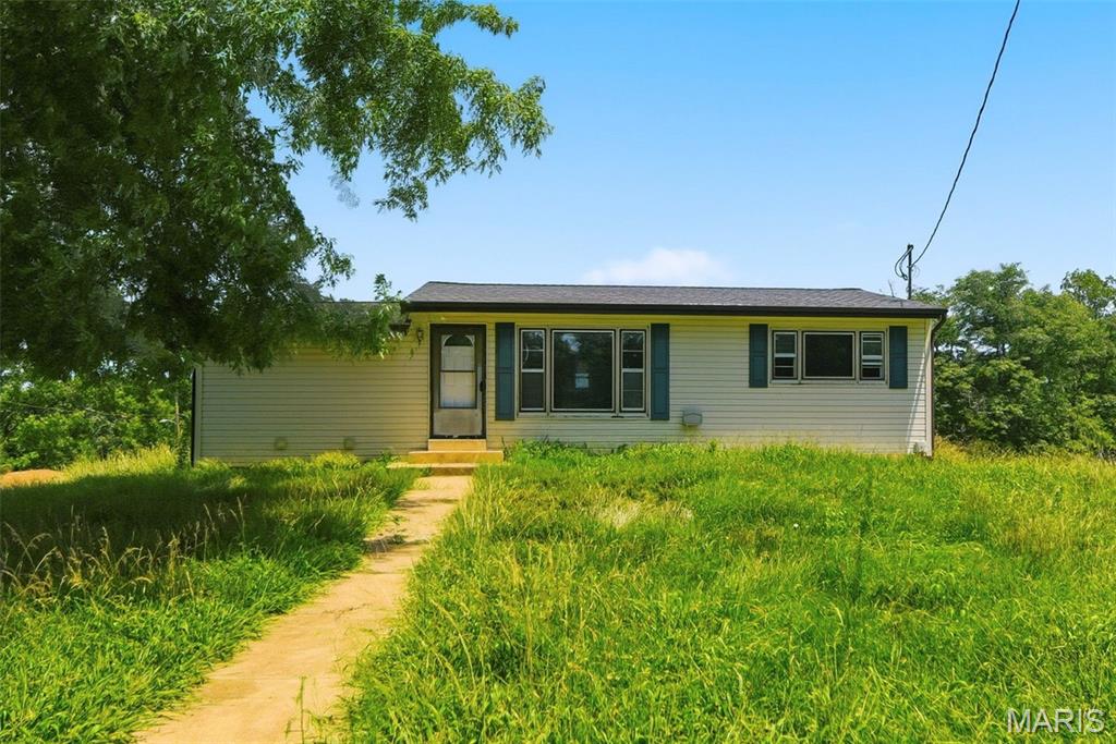 Investment Opportunity! 2 bed/1 bath ranch home with additional family room on a large corner lot! Priced in it's AS-IS condition. Seller to make no repairs.
